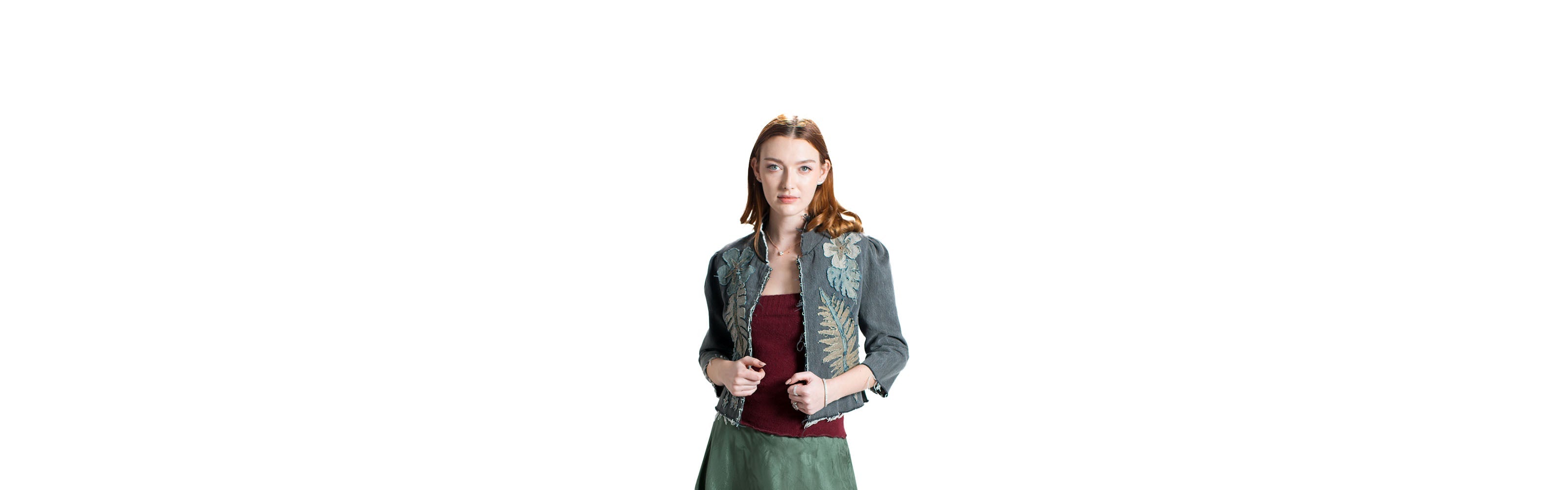 denim jackets and coats header. model in denim applique jacket