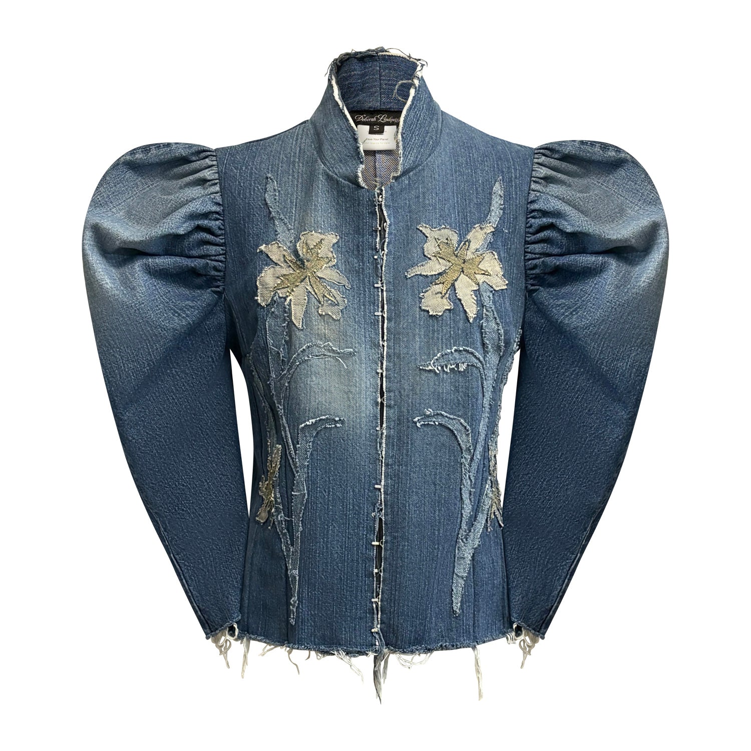 Emma Jacket in faded denim with iris appliqué and raw edge detailing