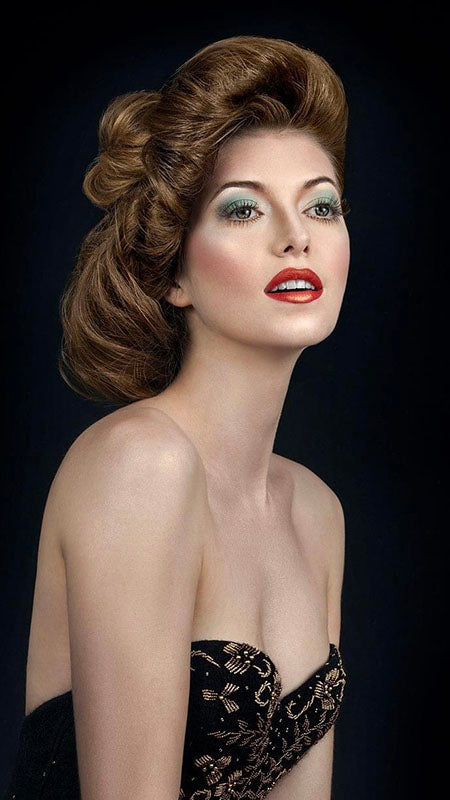 model Black vintage beaded bustier with gold beading and sweetheart neckline.