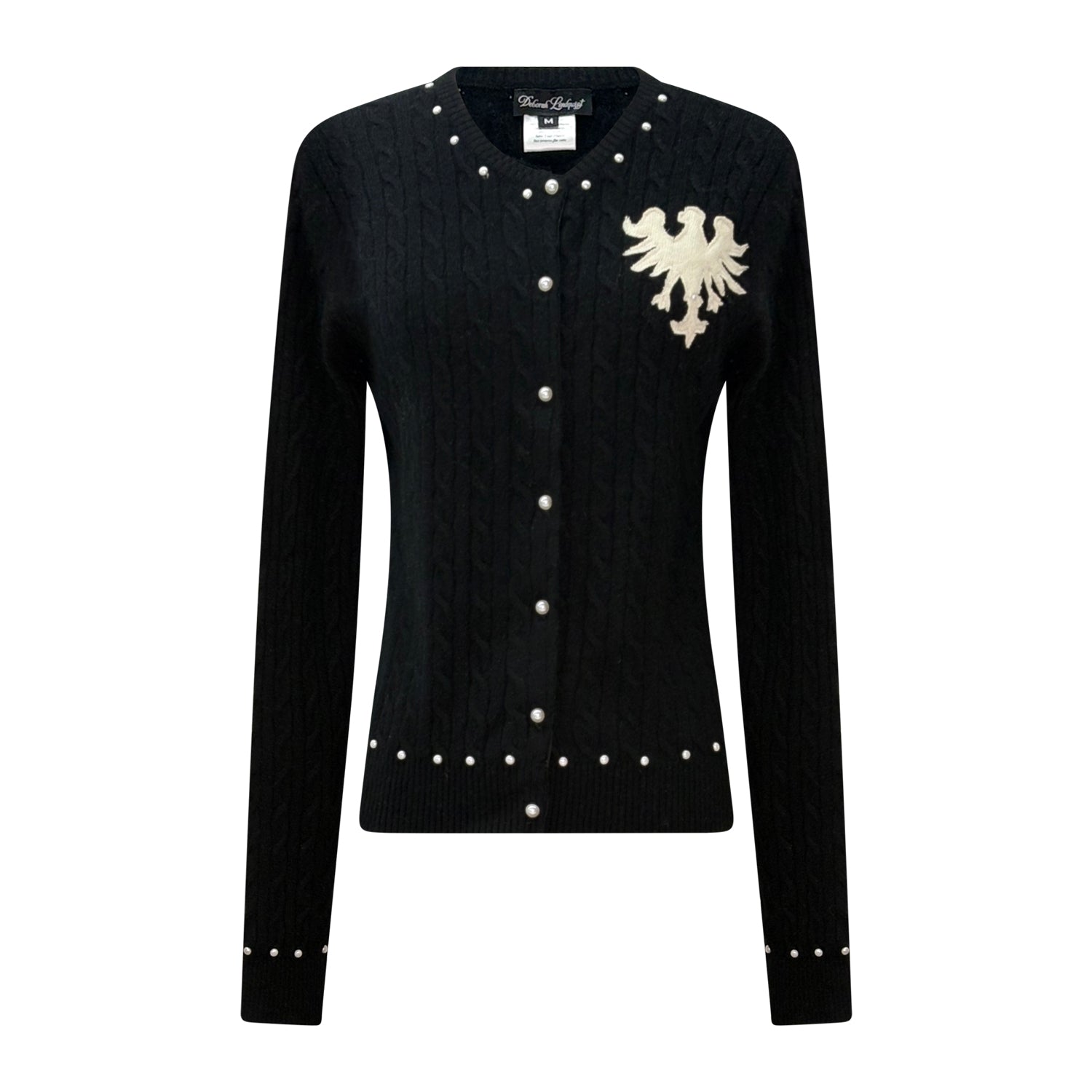 Black cashmere cardigan with pearl buttons and single eagle shield appliqué on the front, from the eco-conscious reincarnated cashmere collection.