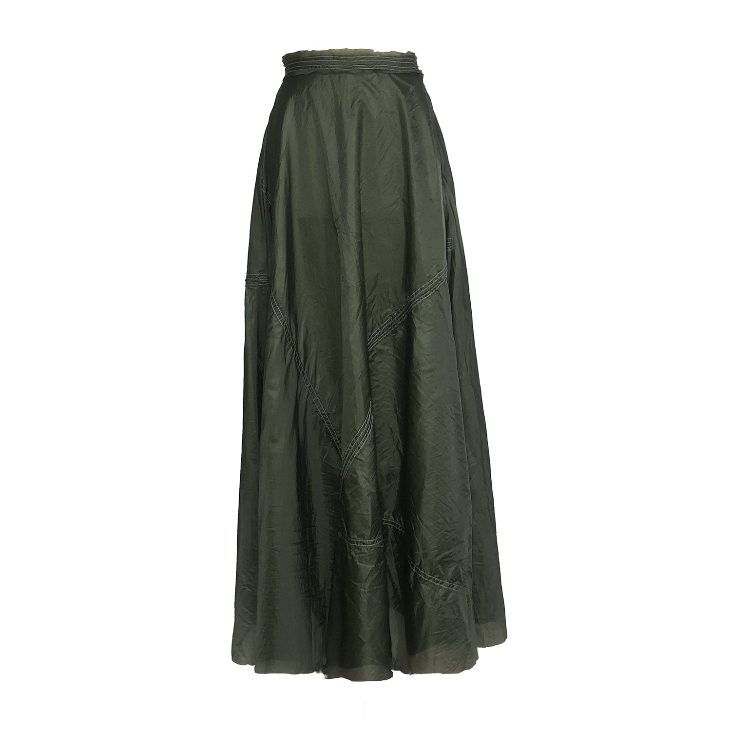 Dramatic olive green parachute skirt in a flowing half-circle silhouette with visible seamline details; made from upcycled military nylon.