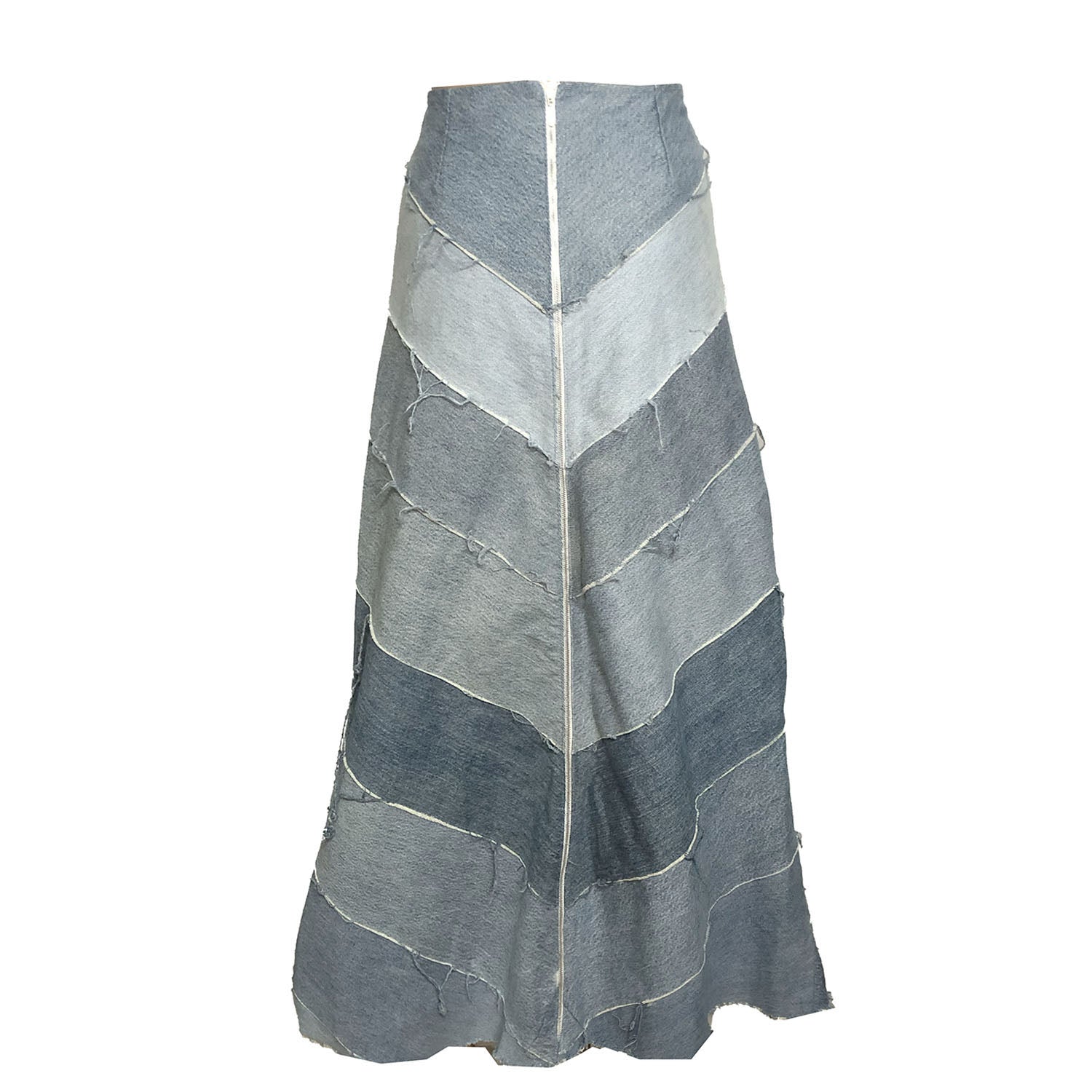 Chevron maxi skirt made from reclaimed denim in varying washes, with a high waist and raw edge