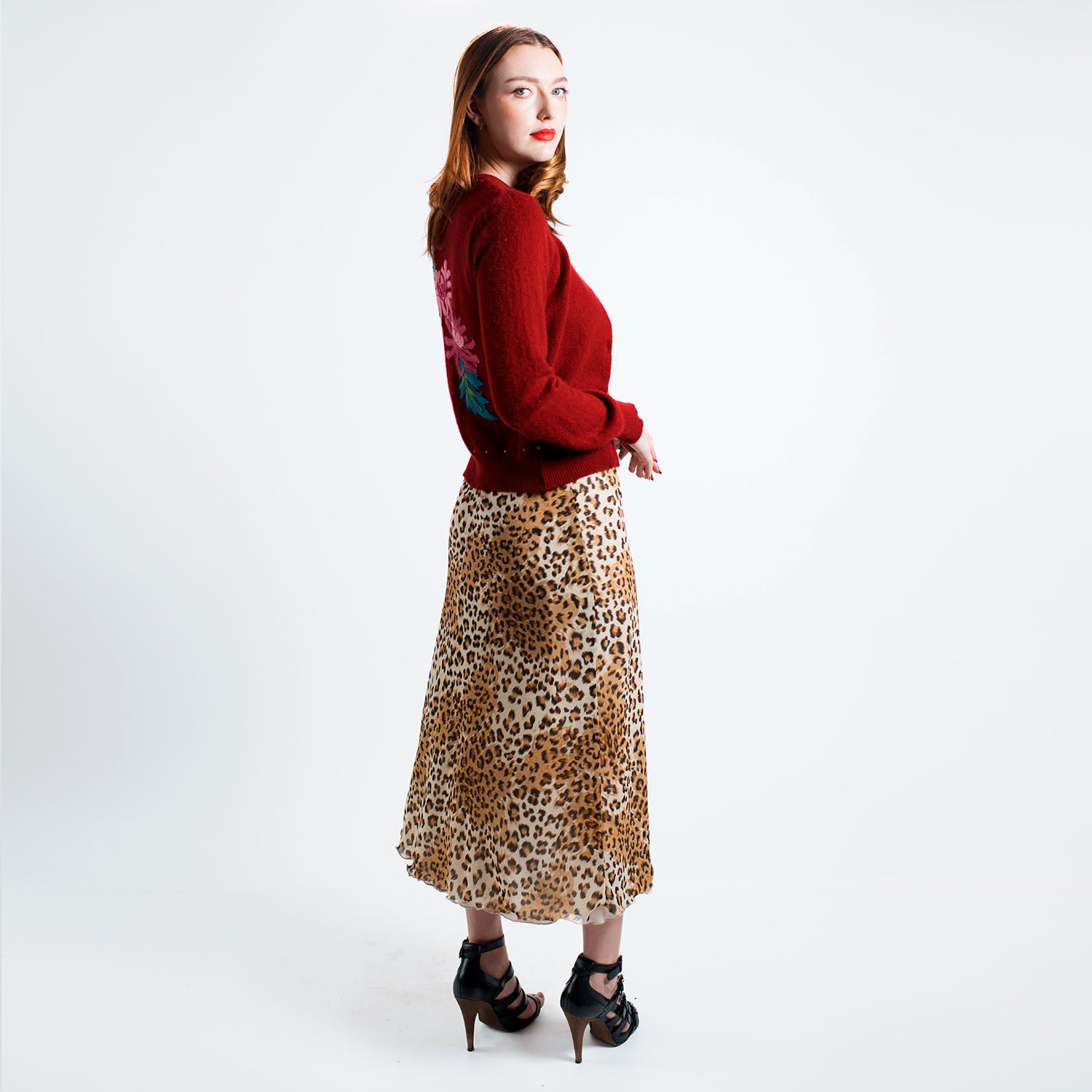 Model wearing Chrysanthemum Cardigan layered over Loretta Vegan Leopard Slipdress
