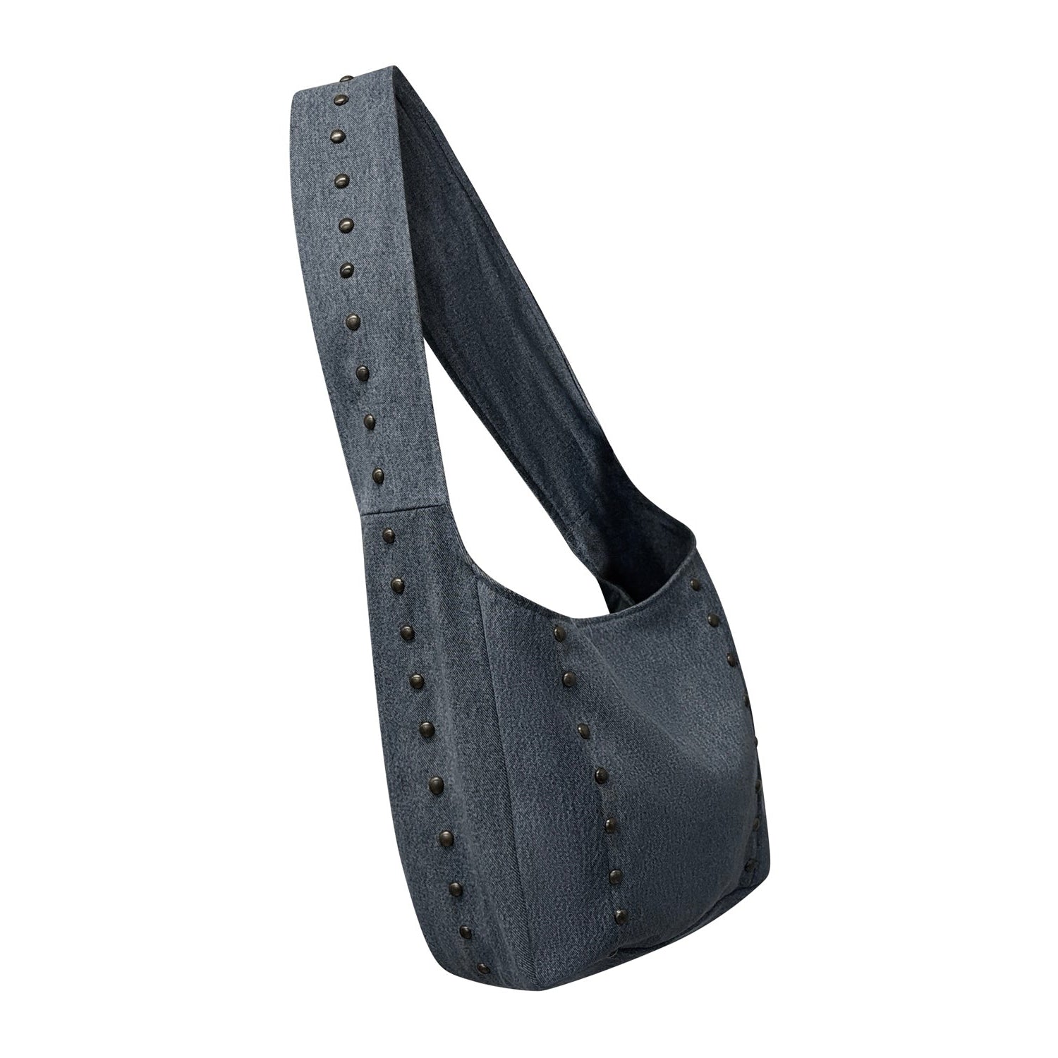 Upcycled black denim tote bag with bronze stud detailing and crossbody strap—minimalist rock-chic silhouette.