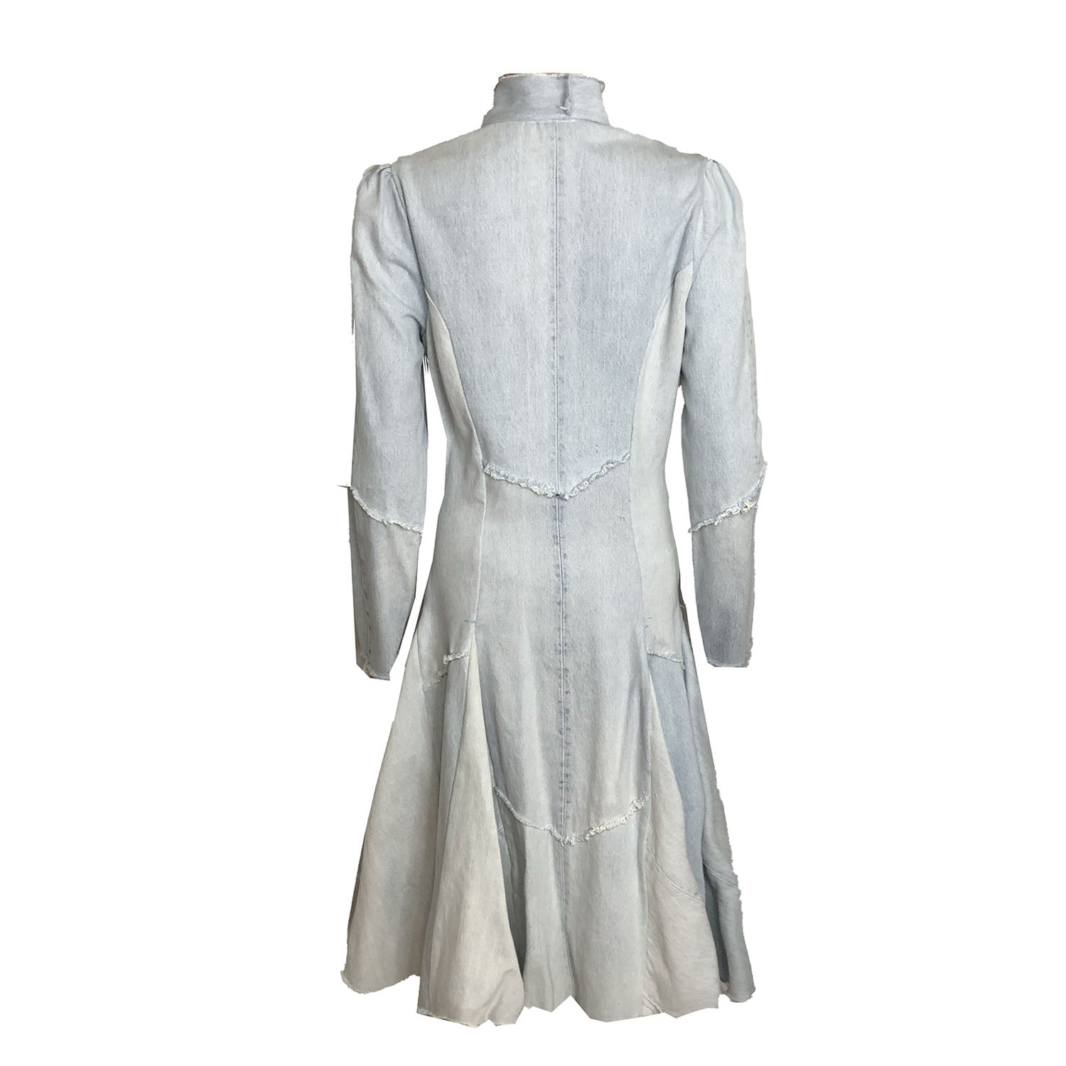 Fit-and-flare pale washed upcycled denim coat with mandarin collar, zip front, and flared skirt silhouette on white background.