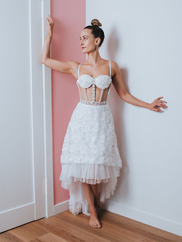Rosette Bustier – Sheer caged bridal bustier with floral ribbon detailing, pearl and rhinestone embellishment.