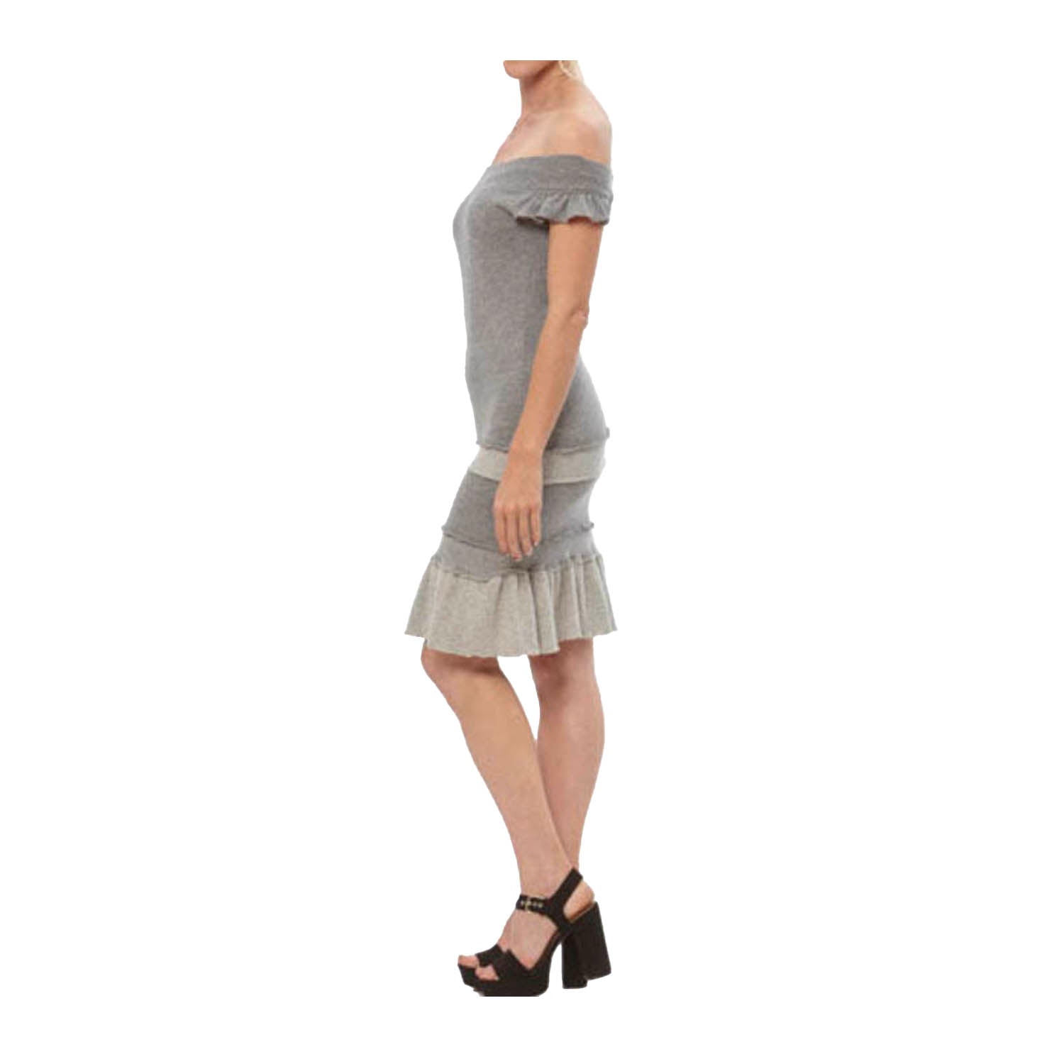 model side Grey heather cashmere mini dress with off-shoulder neckline, flutter sleeves, and ruffled skirt details.
