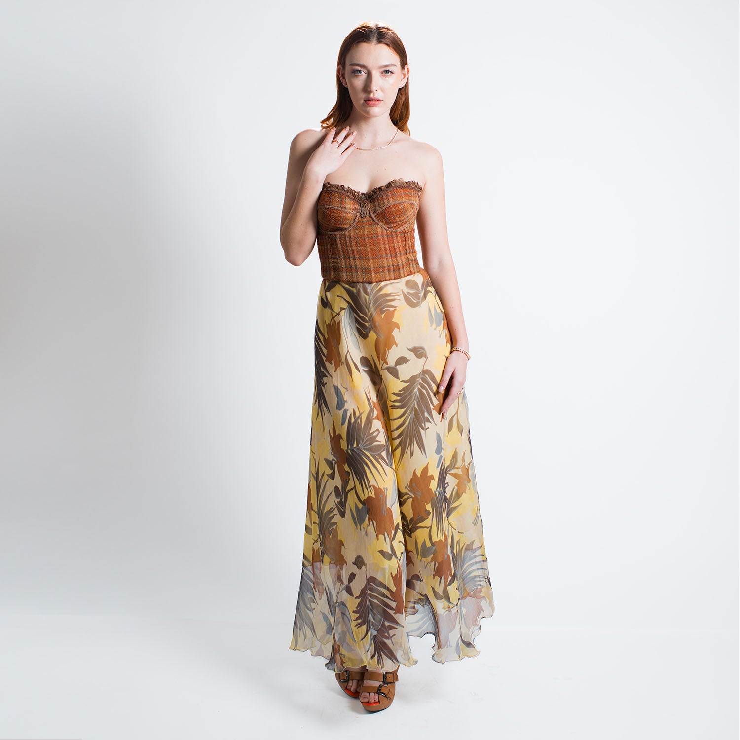 model in Isla Skirt in tropical floral silk chiffon, full-length with flowing silhouette,