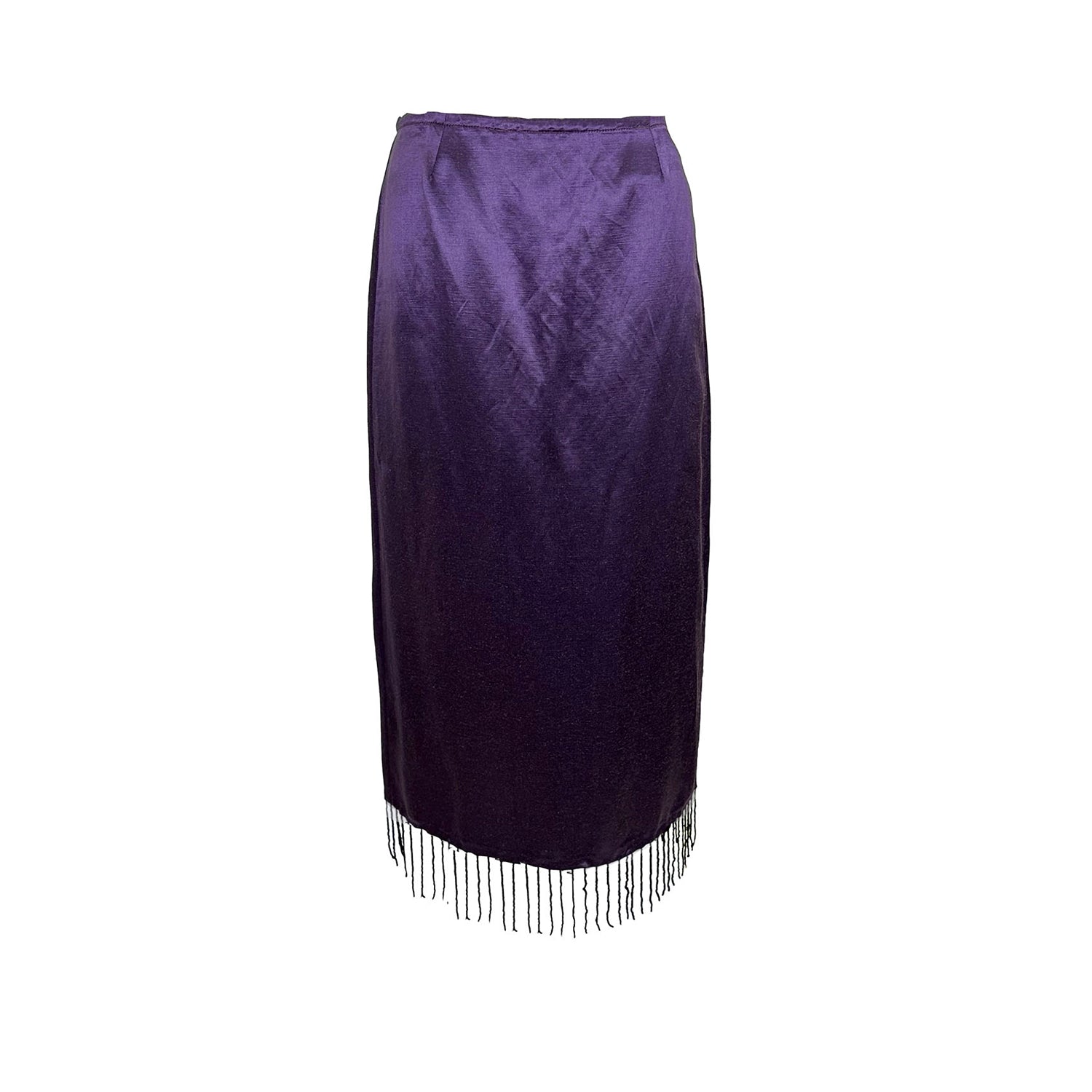 Lola pencil skirt in purple hemp silk with beaded fringe, below-the-knee length, styled with a green parachute hoodie.