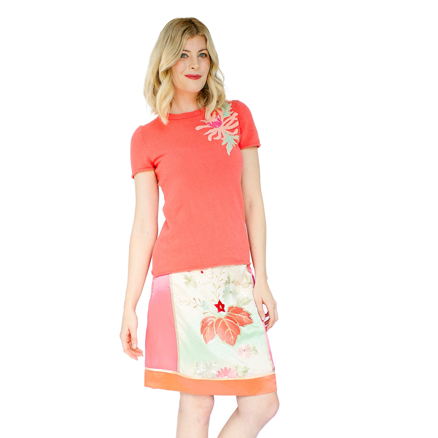 model in Grace Skirt Pastel Floral in hand-painted and embroidered vintage kimono silk with cream, green, coral and pink floral motifs.