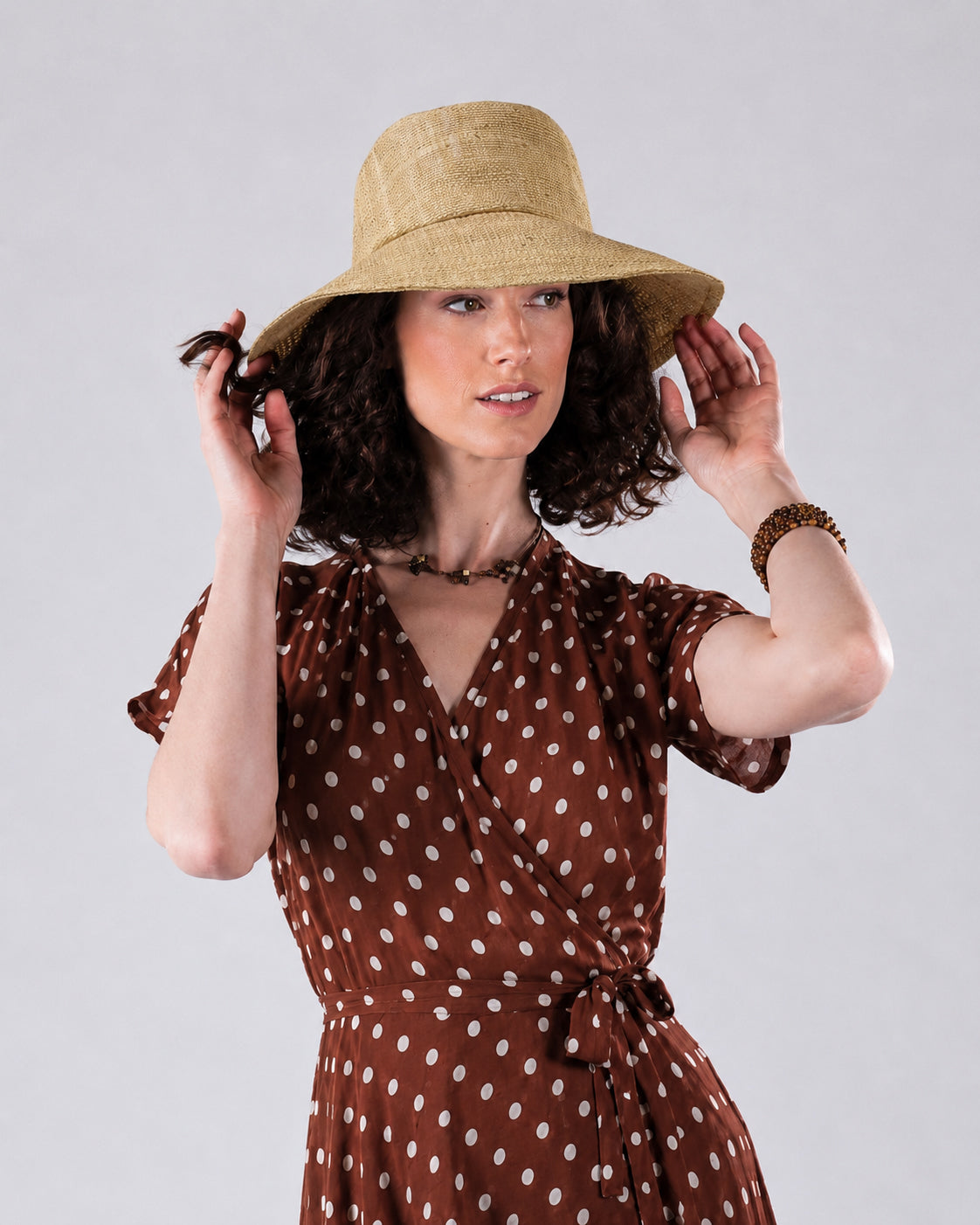 raffia bucket hat on model
