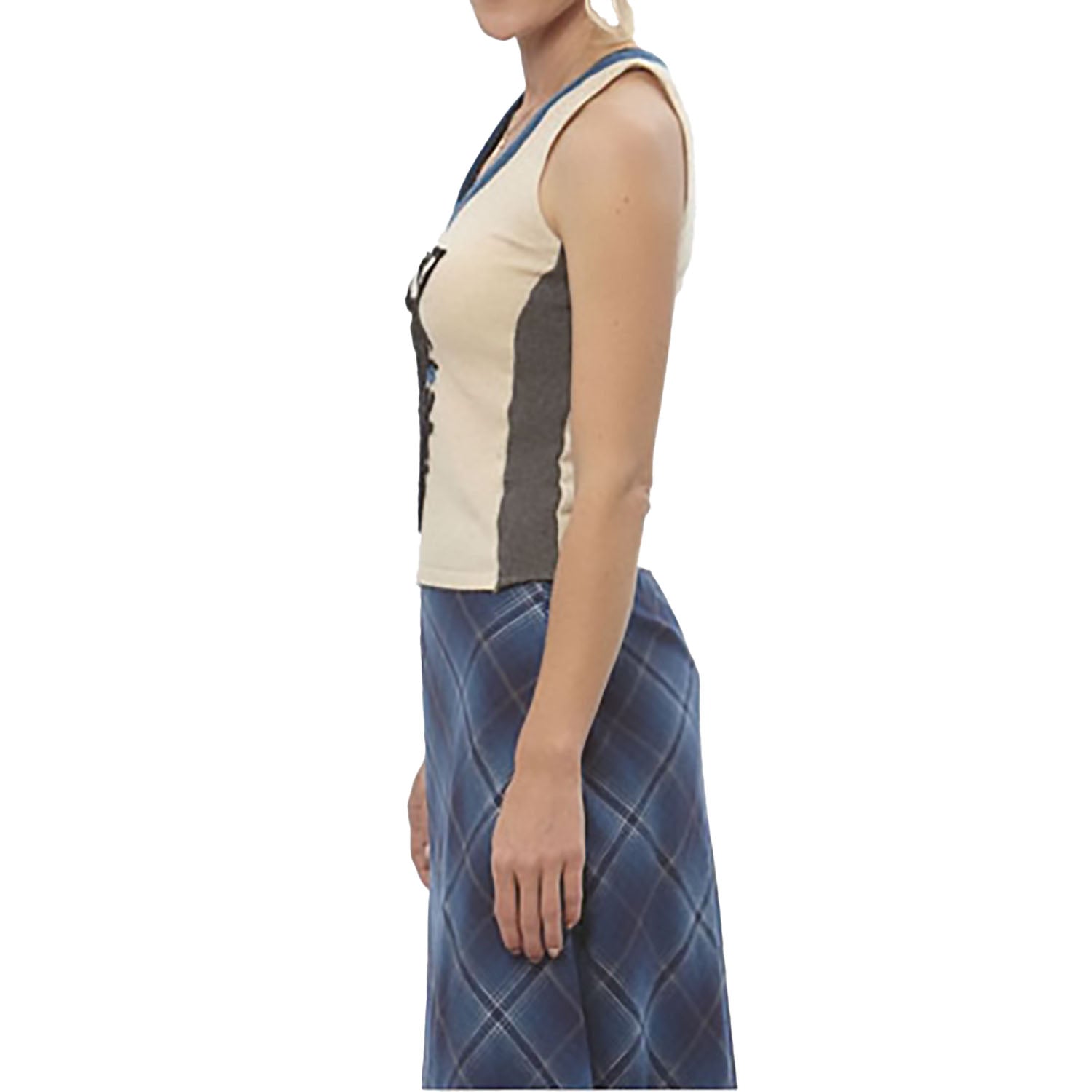 Beige cashmere sweater vest with black zebra appliqué and contrast blue v-neck trim.