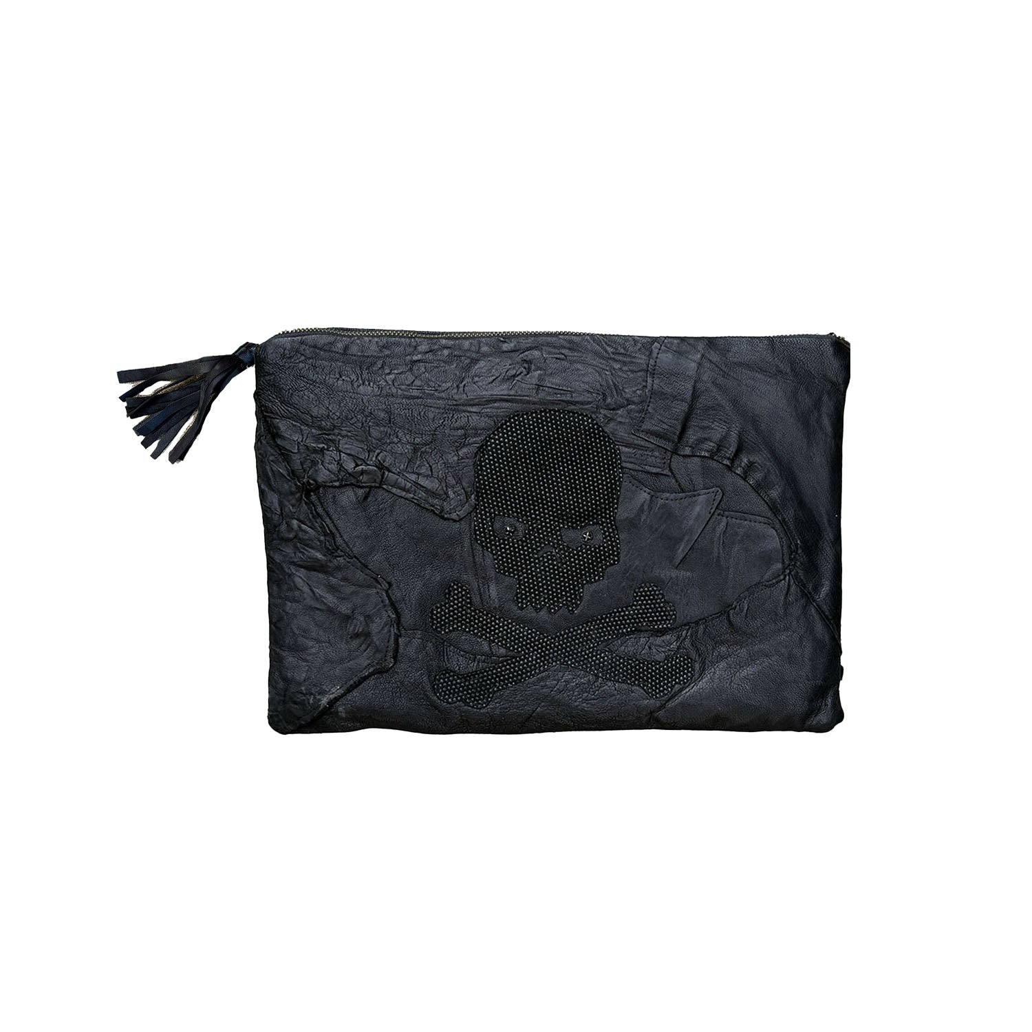 Black upcycled leather clutch bag with layered skull appliqué and rhinestone center, featuring a tassel zipper
