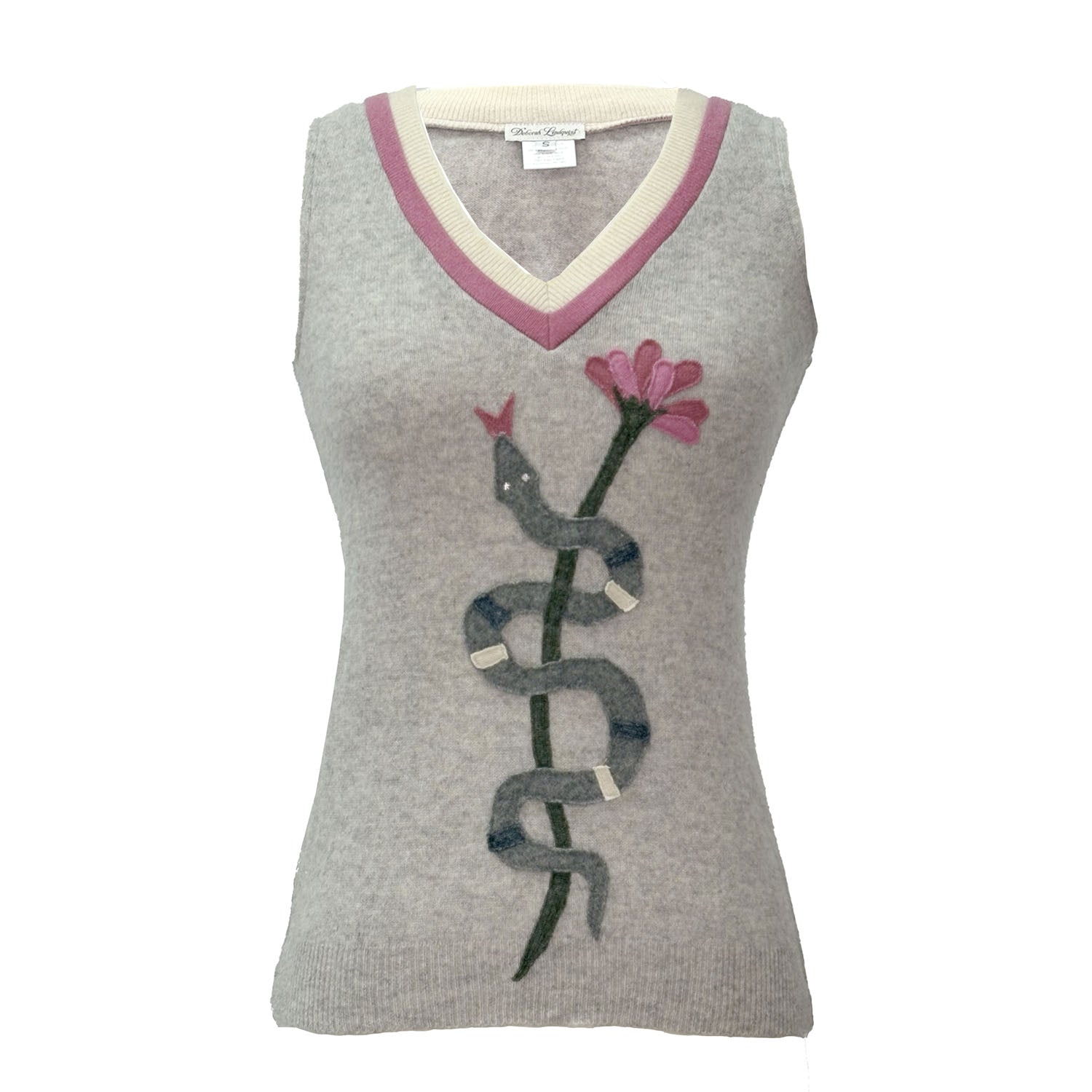 Light grey cashmere sweater vest with pink and cream V-neck, featuring a dark green snake and pink flower appliqué at center front.