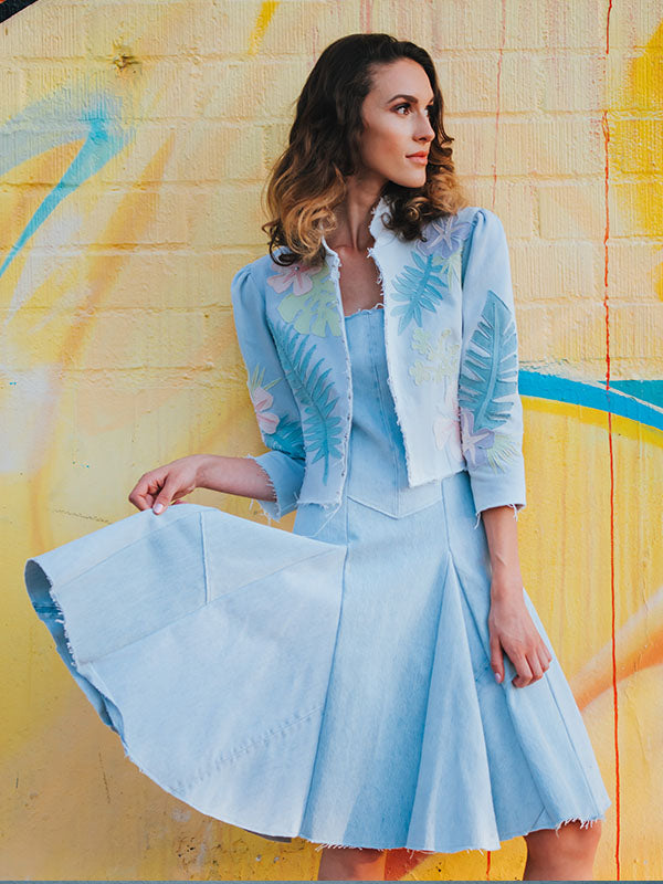 Audrey tropical applique bleached denim jacket. Model image