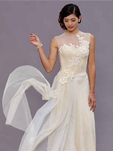 model Vivienne Beaded wool bustier with illusion neckline and English net side train.