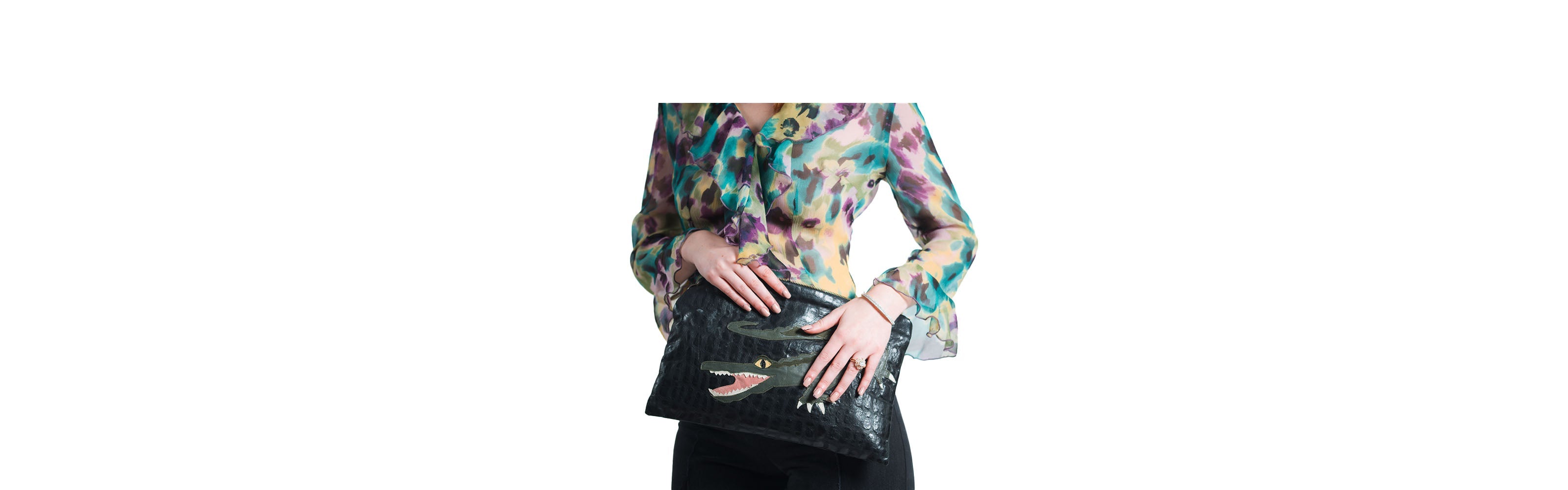 alligator applique bag on model with silk blouse