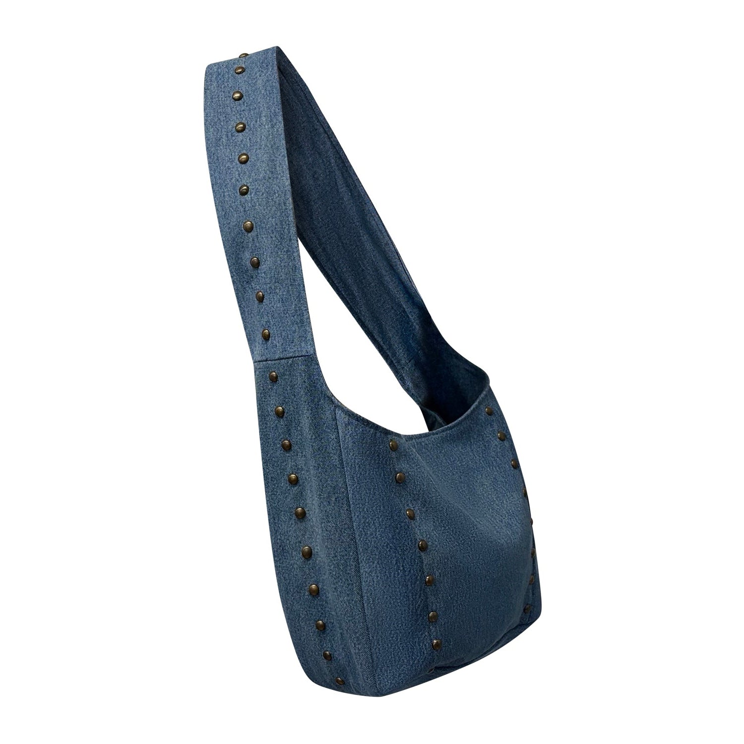 Upcycled blue denim tote bag with bronze stud detailing and crossbody strap—minimalist rock-chic silhouette.