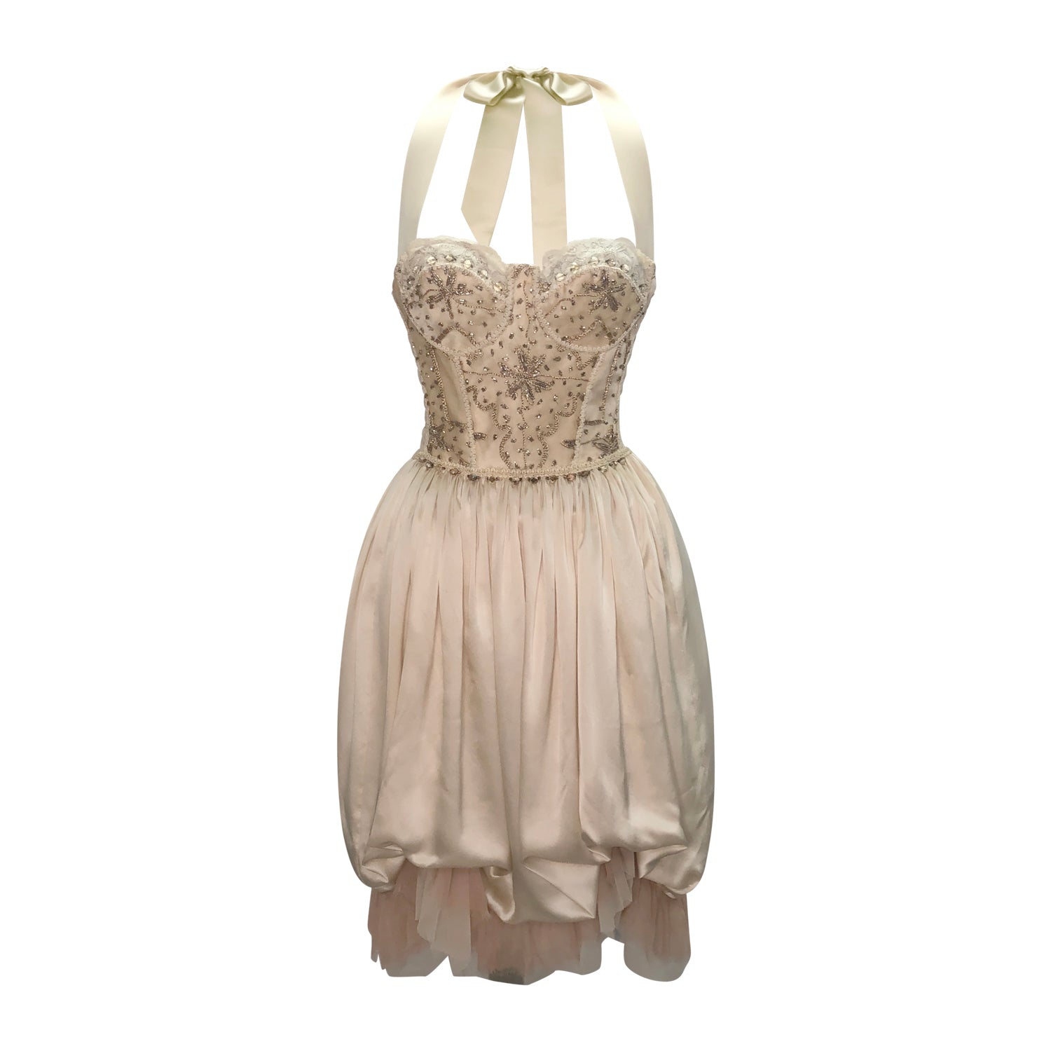 Brittany Dress – One-of-a-kind halter gown with hand-beaded bodice, bustled silk skirt, and layered chiffon hem