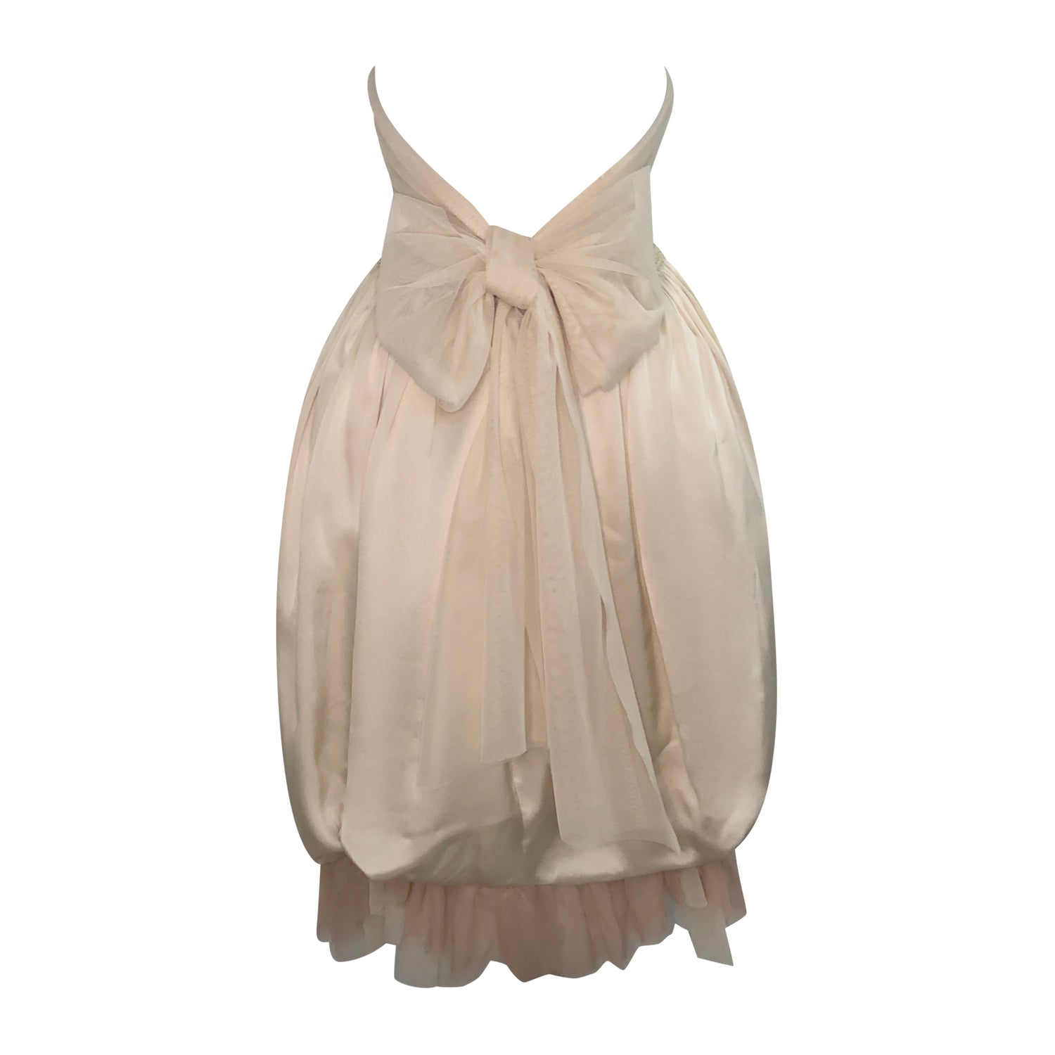 back Brittany Dress – One-of-a-kind halter gown with hand-beaded bodice, bustled silk skirt, and layered chiffon hem