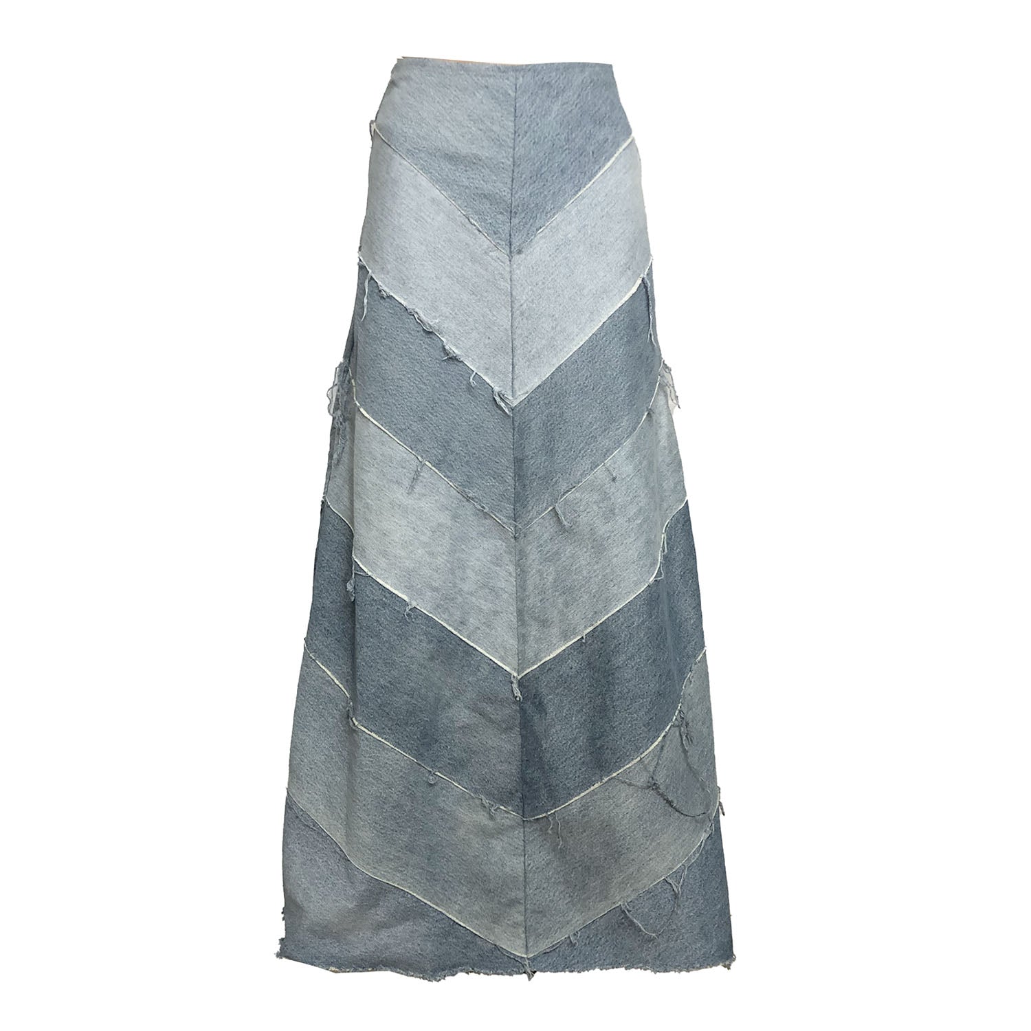 Chevron maxi skirt made from reclaimed denim in varying washes, with a high waist and raw edge detailing.