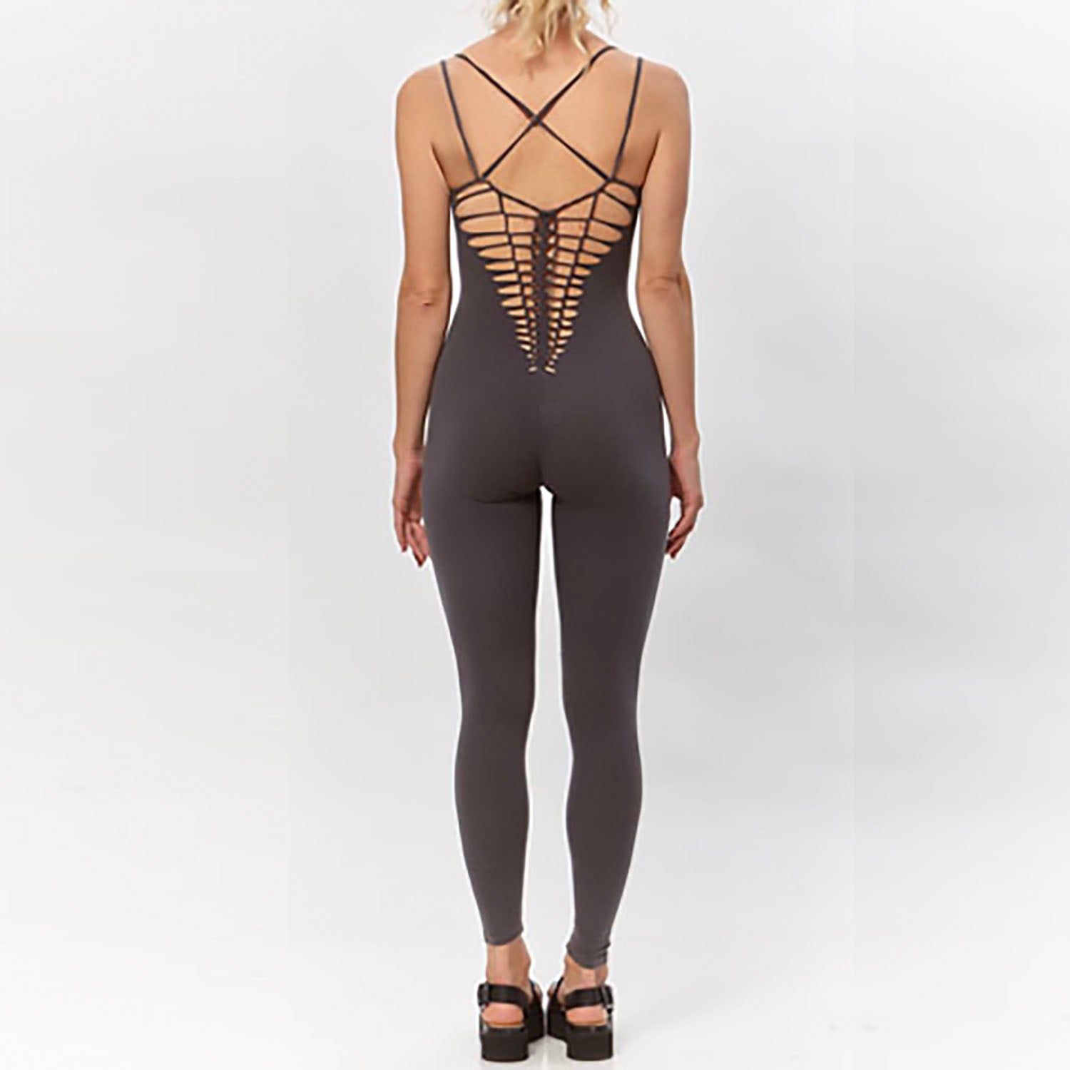 Clarice Catsuit – Long-leg cotton and spandex catsuit with crocheted V-shaped back detail, made from sustainable deadstock fabric.