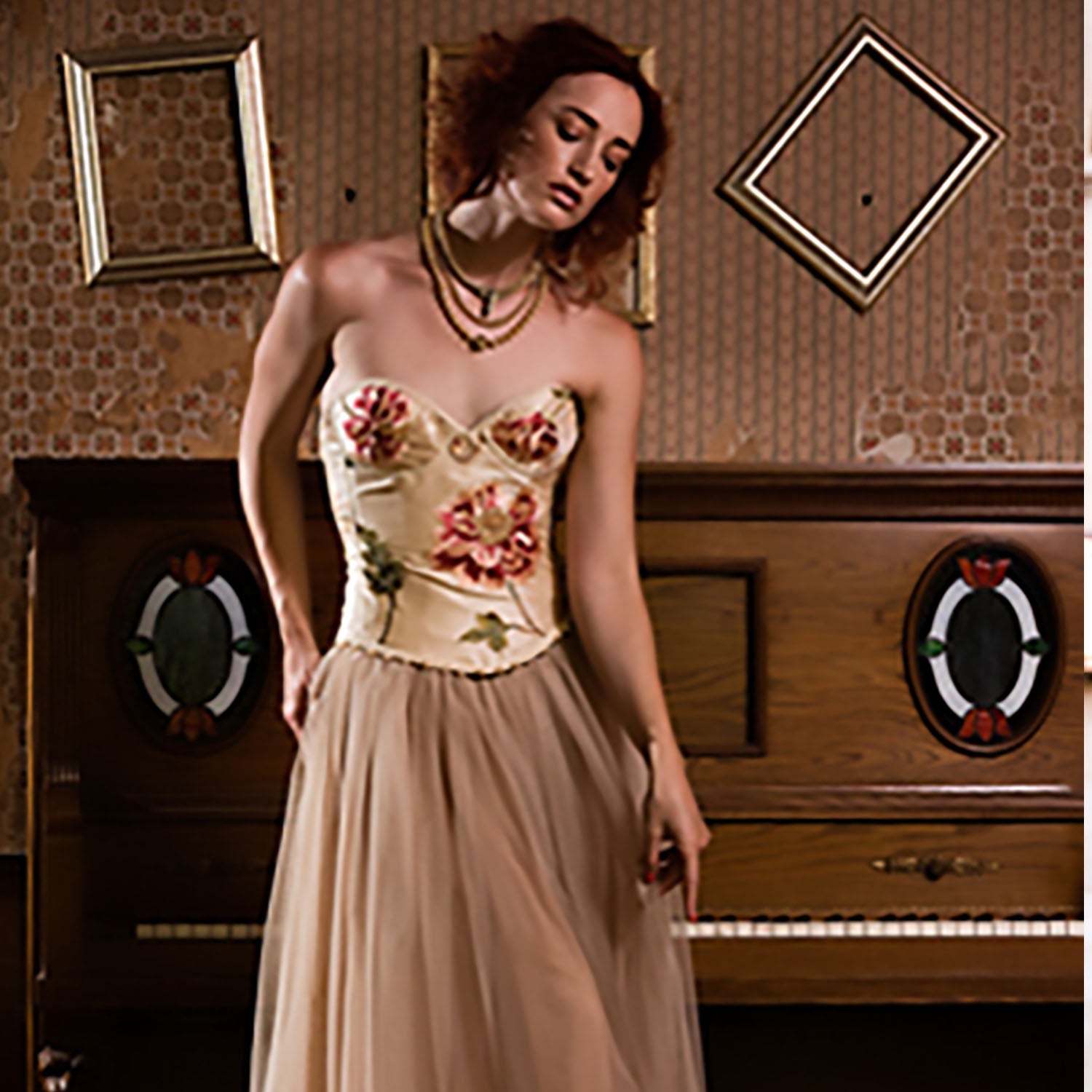 Flora Bustier – A one-of-a-kind 34B silk taffeta bustier with intricate embroidery and hand beading, styled on a model standing 5'9" tall.