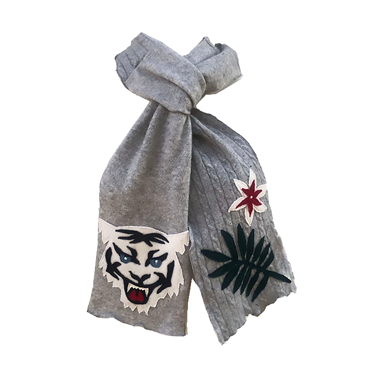 grey cashmere scarf with tiger face, tropical leaf, and red flower appliqué.