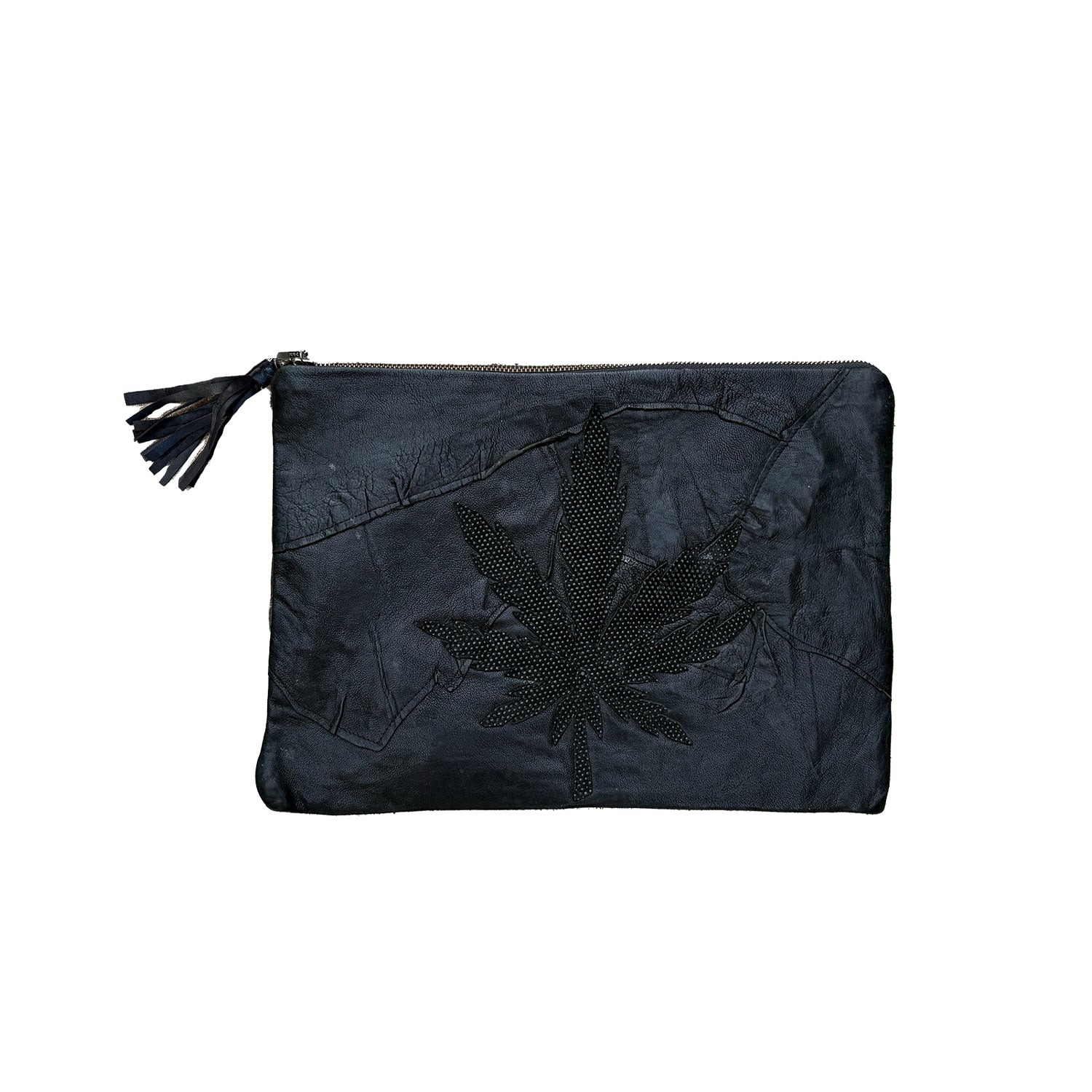 Limited edition eco-conscious leather clutch bag with hemp appliqué.