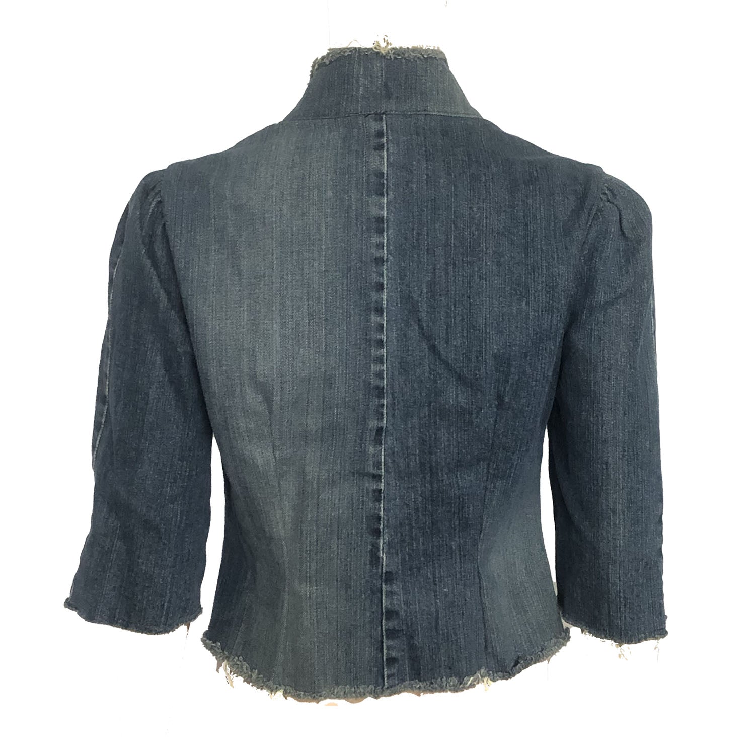 Back Iris Jacket – upcycled denim jacket with vintage leather floral appliqué, raw hem, and hook closure, shown with gathered elbow-length sleeves.