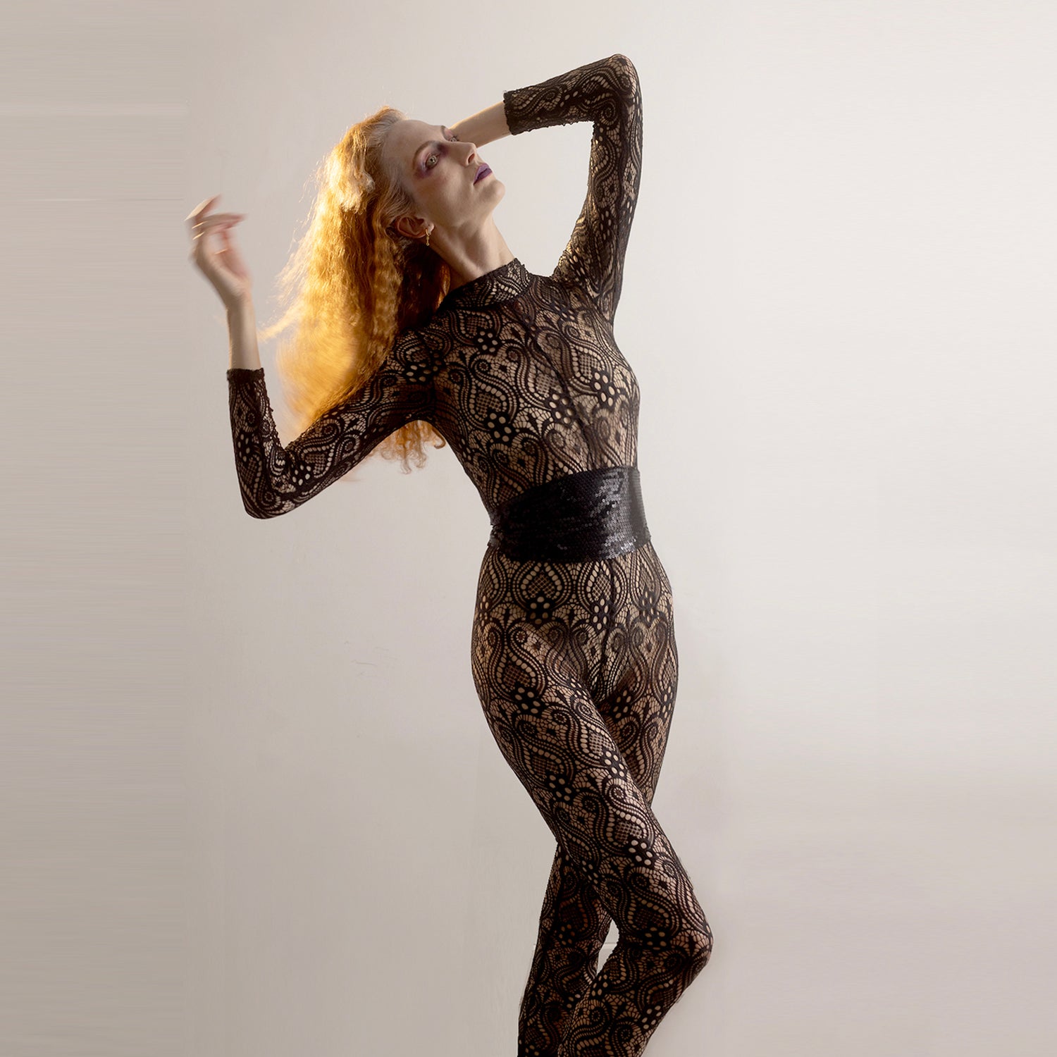 Ivey Catsuit – Long sleeve turtleneck lace catsuit with back zipper, made from sustainable deadstock fabric.