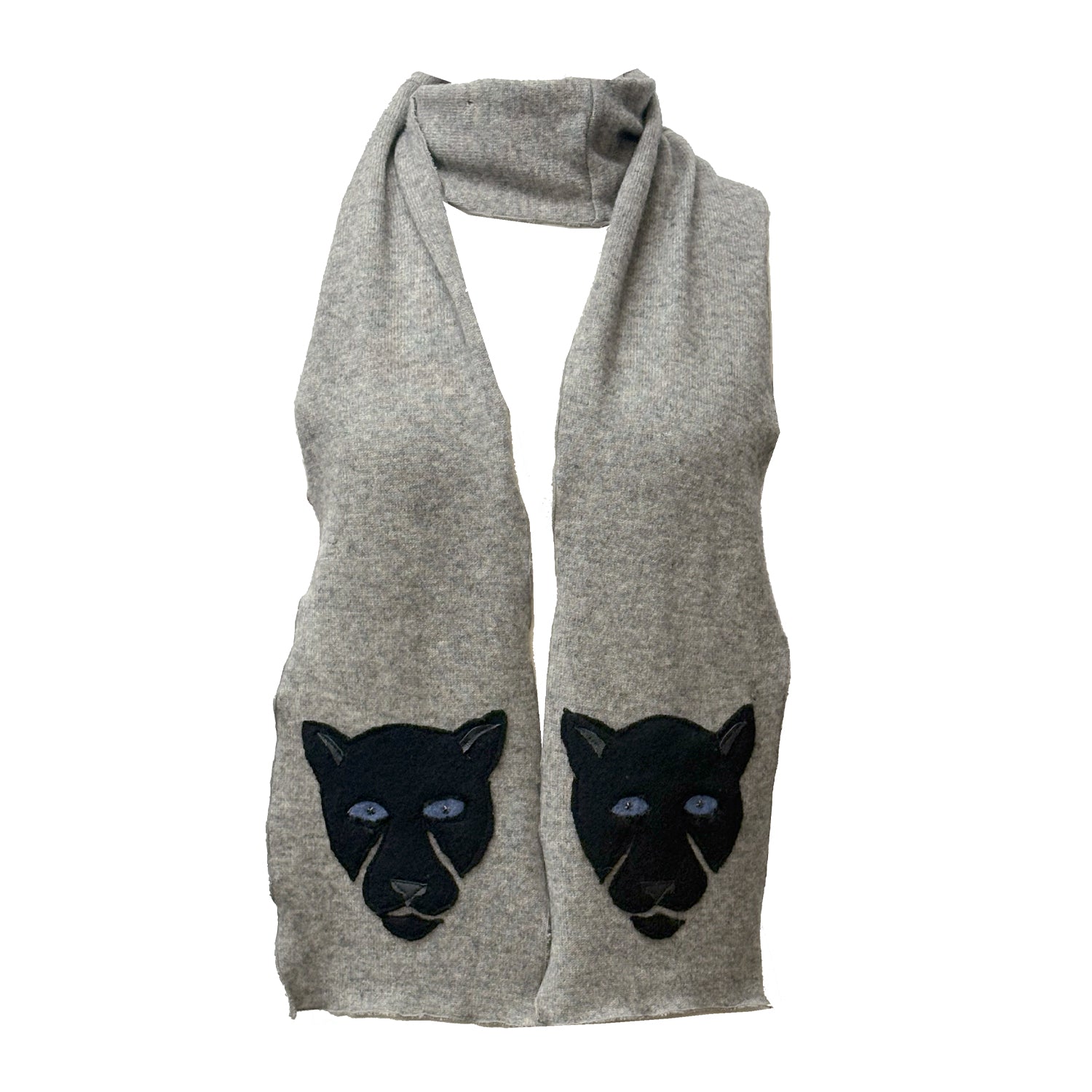 A reincarnated cashmere scarf in heathered stone grey, with mirrored black panther appliqués and pale blue eyes. 