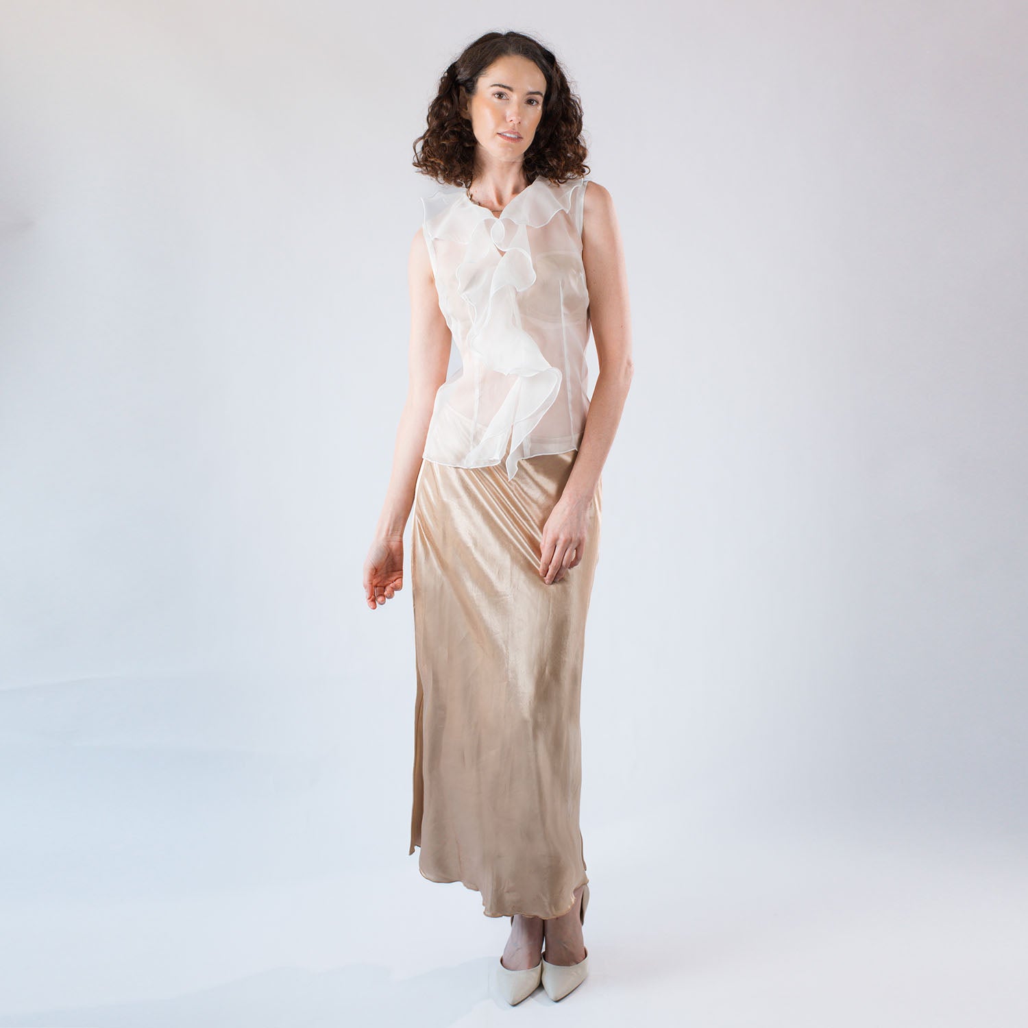 Model wearing the Anaïs Silk Organza Blouse styled with a champagne hemp silk slip skirt.