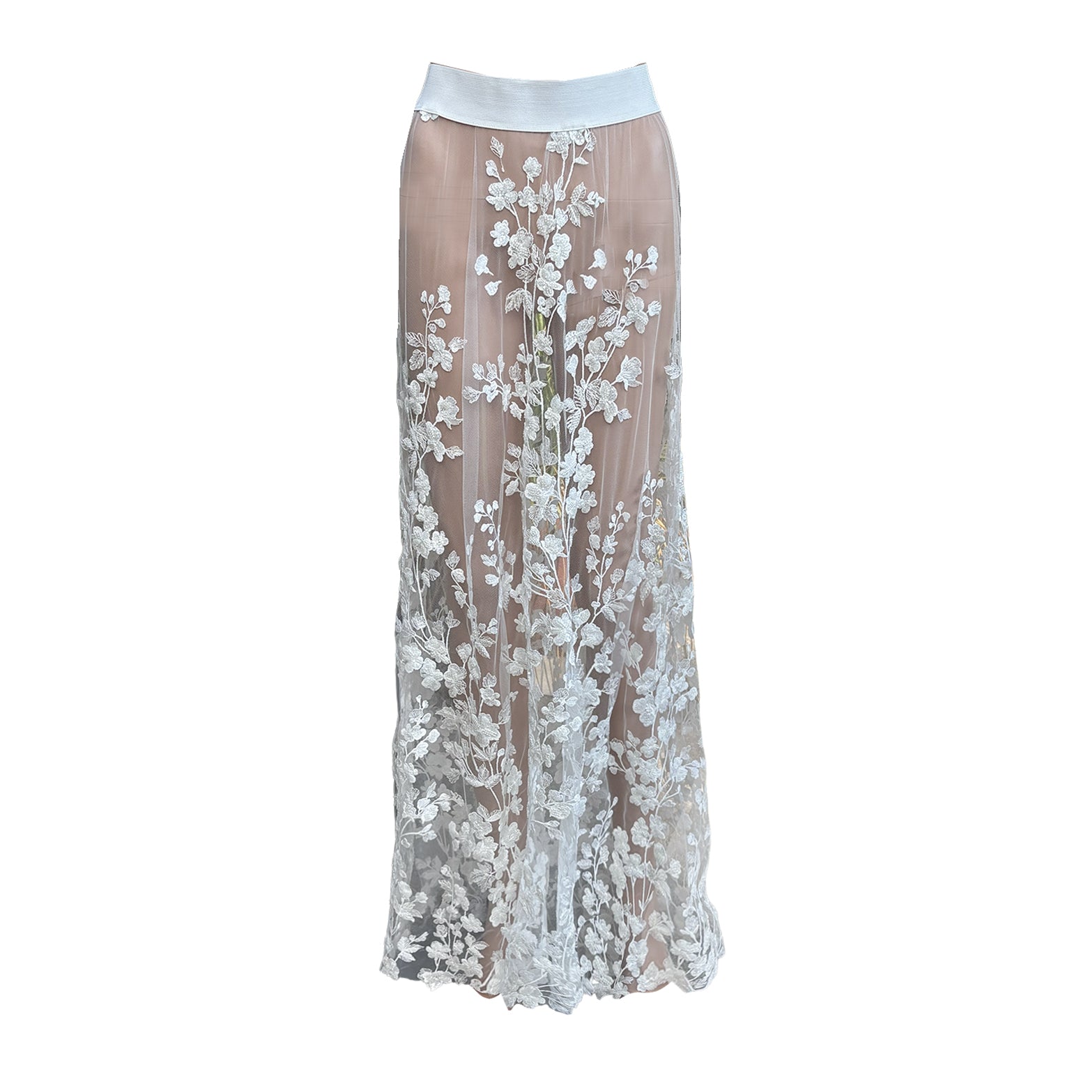 Sylvie one-of-a-kind sheer maxi skirt in white embroidered floral lace with delicate beadwork and an elastic waistband.