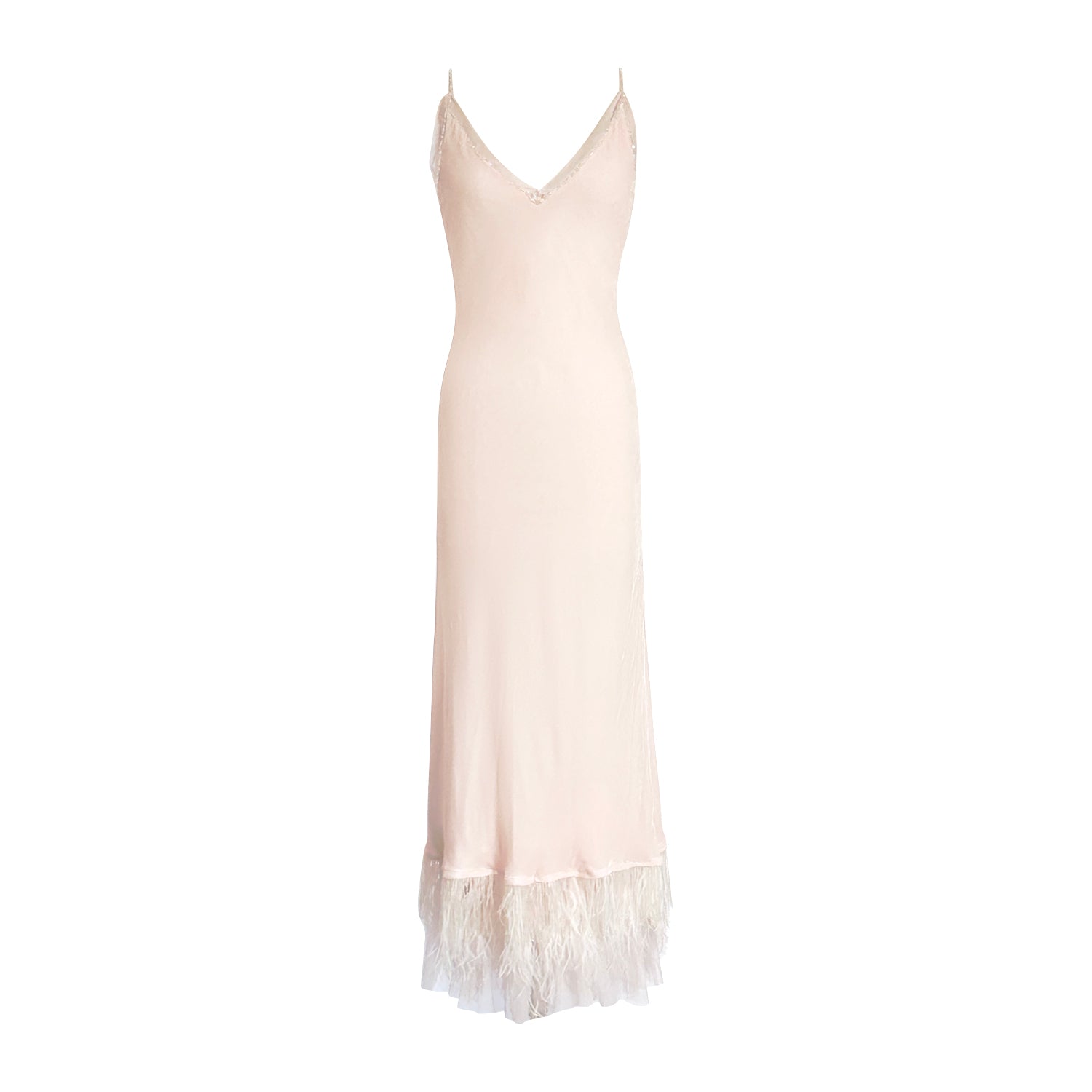 blush silk slip gown with crystal beading, feather and fringe hem