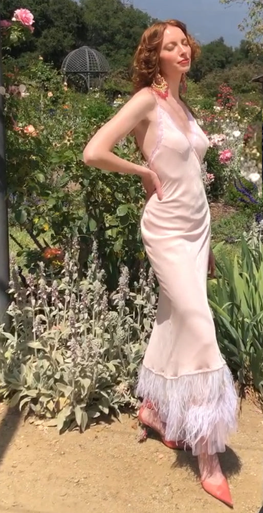 blush silk slip gown with crystal beading, feather and fringe hem