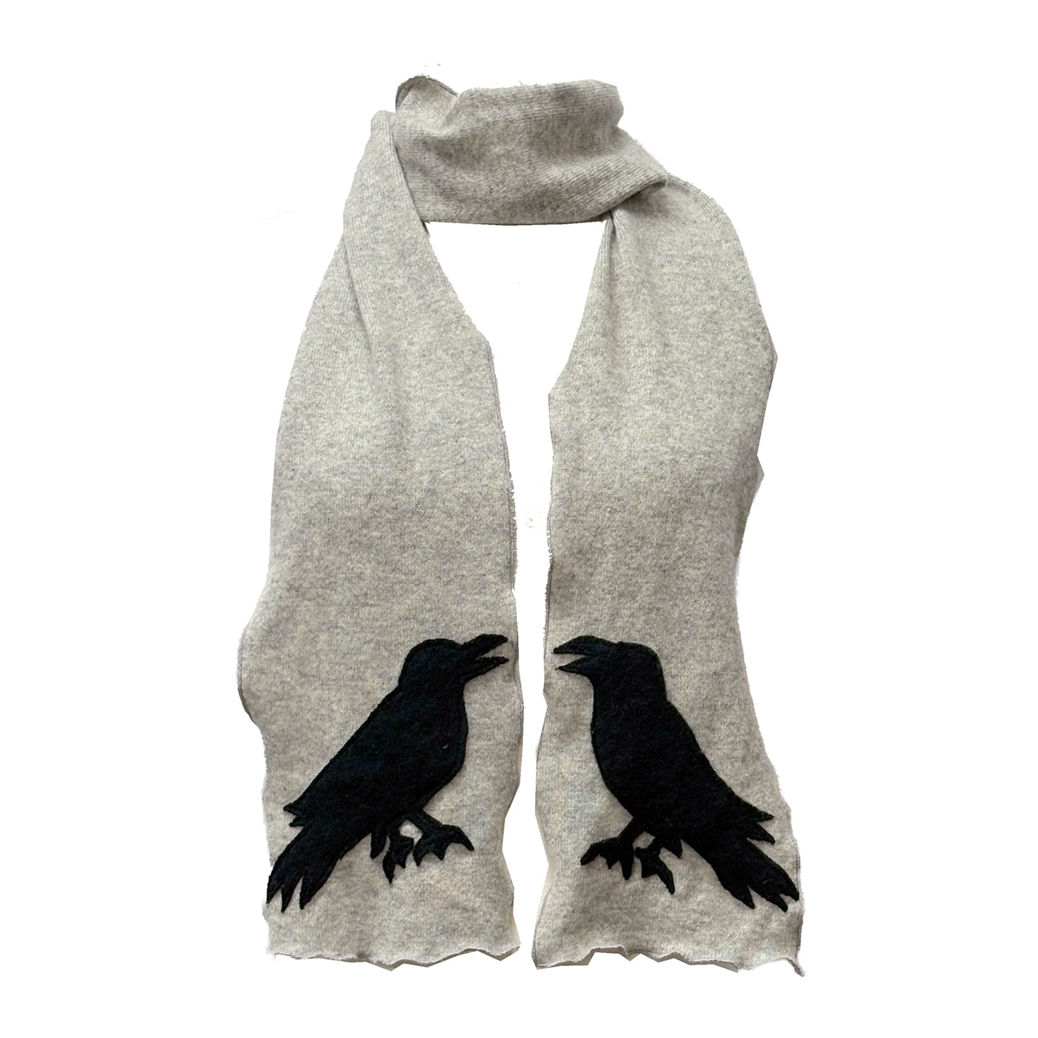 A subtle, ancestral version of our signature raven scarf in soft grey reincarnated cashmere