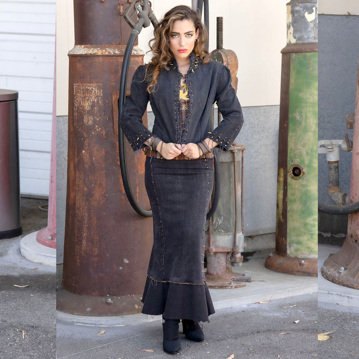 Suzi Jacket in distressed black denim with brass spikes and corset back, glam punk design by Deborah Lindquist
model wearing 