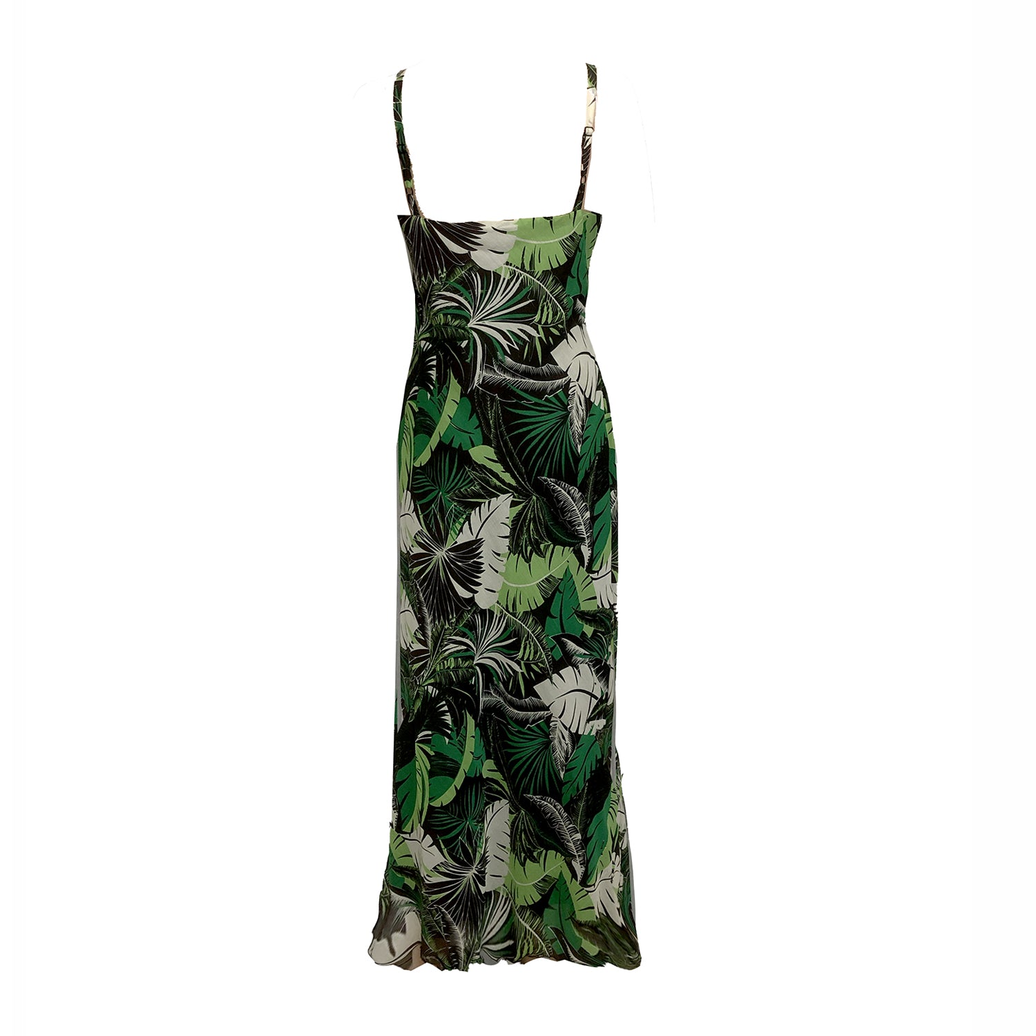 back Tropical print slip dress with adjustable straps, bias-cut silhouette, and flounced hem, made from silk-cotton deadstock fabric.