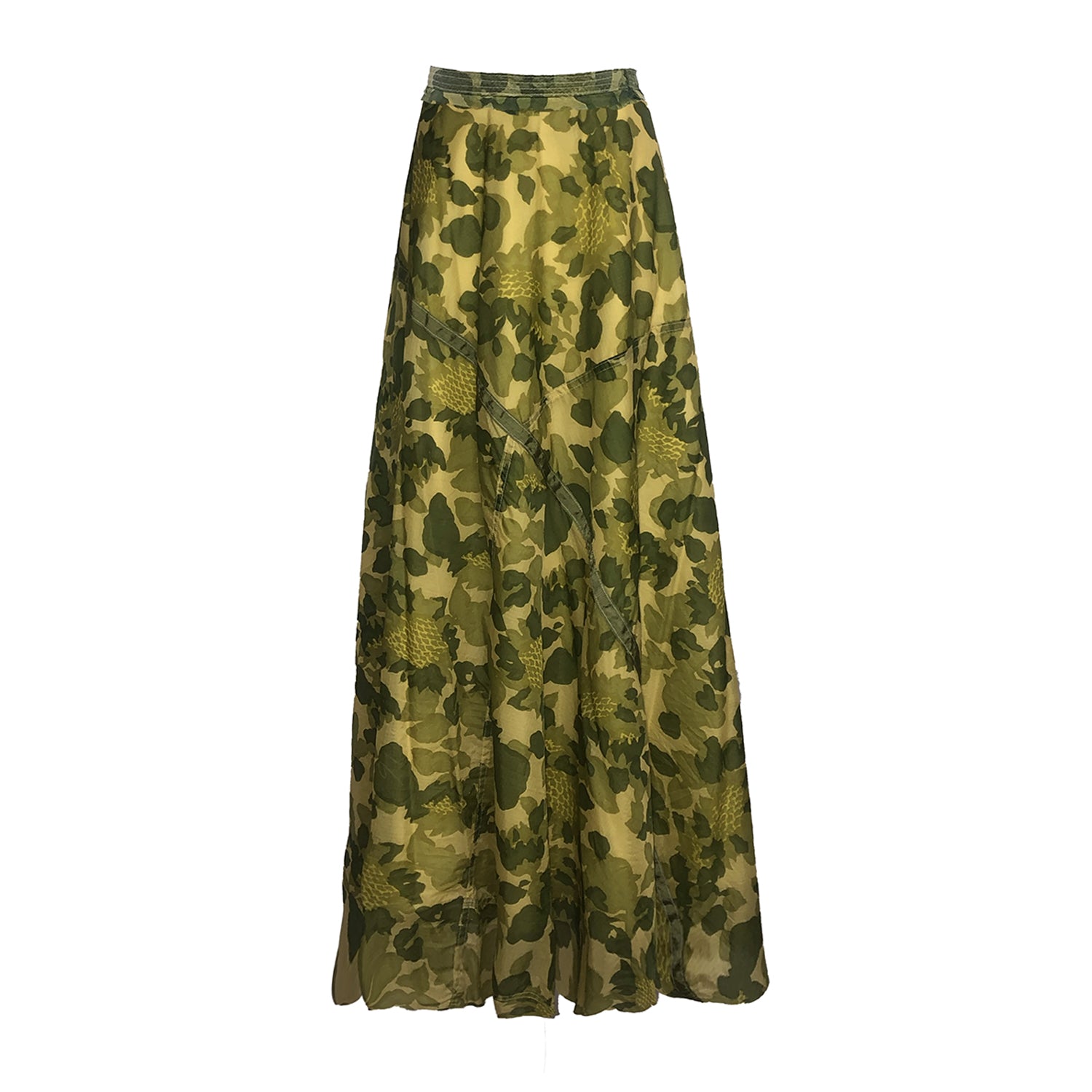 Full-length camo parachute skirt with a dramatic half-circle silhouette and hidden sunflower details; crafted from upcycled military nylon with visible seamlines.