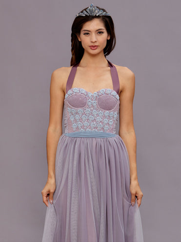 Model wearing the Ava Lavender Beaded Gown featuring a vintage beaded wool bodice, pale blue pearl accents, and a gathered English net skirt in a soft dusty mauve hue.