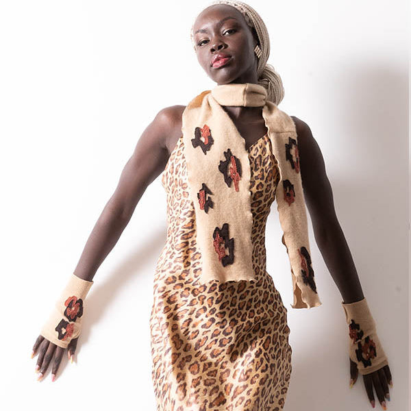 Tan cashmere scarf and fingerless glove set with black and rust leopard appliqué and rhinestone accents.