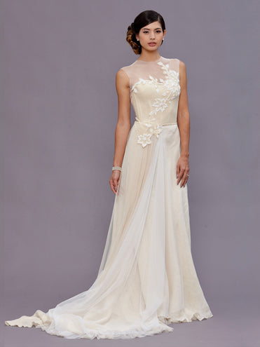 model Vivienne Beaded wool bustier with illusion neckline and English net side train.